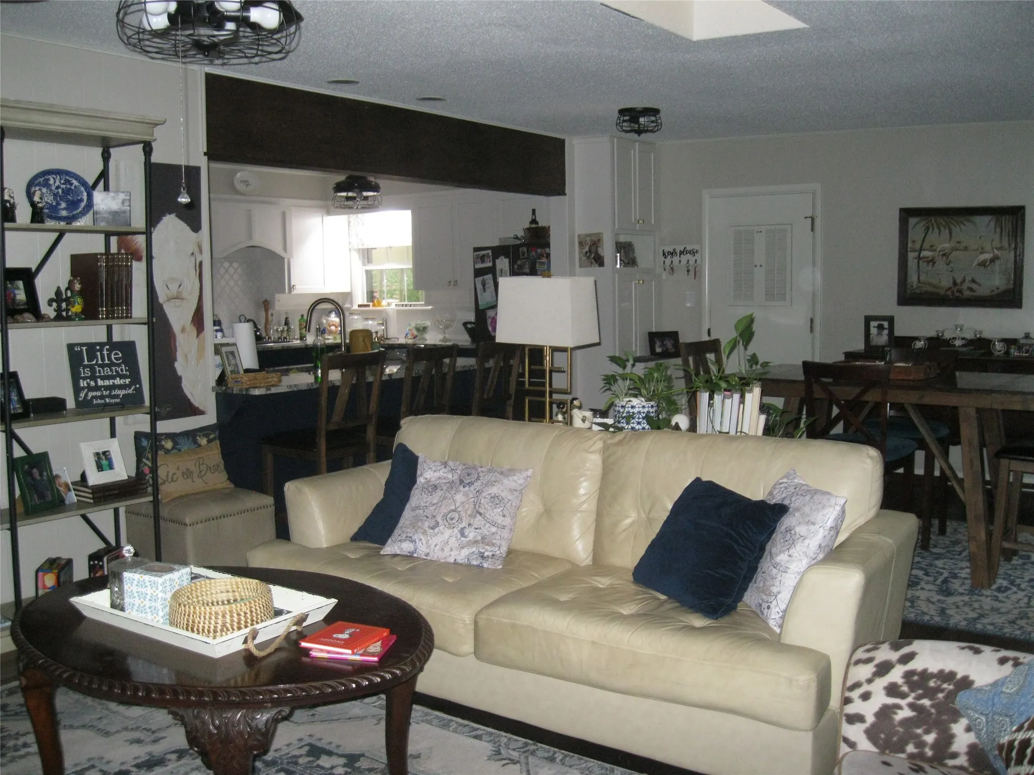 Living area featuring a textured ceiling