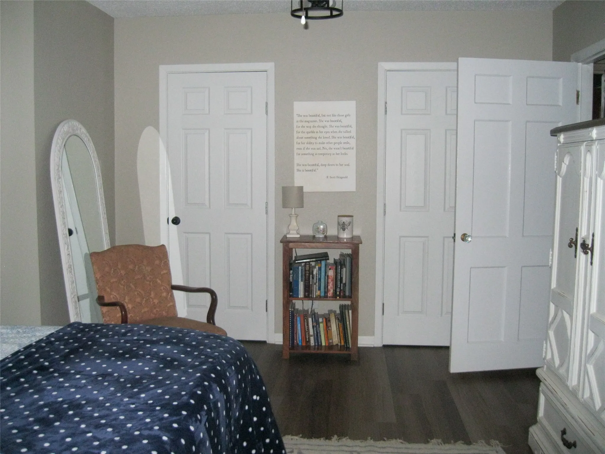 Bedroom featuring dark wood-style floors