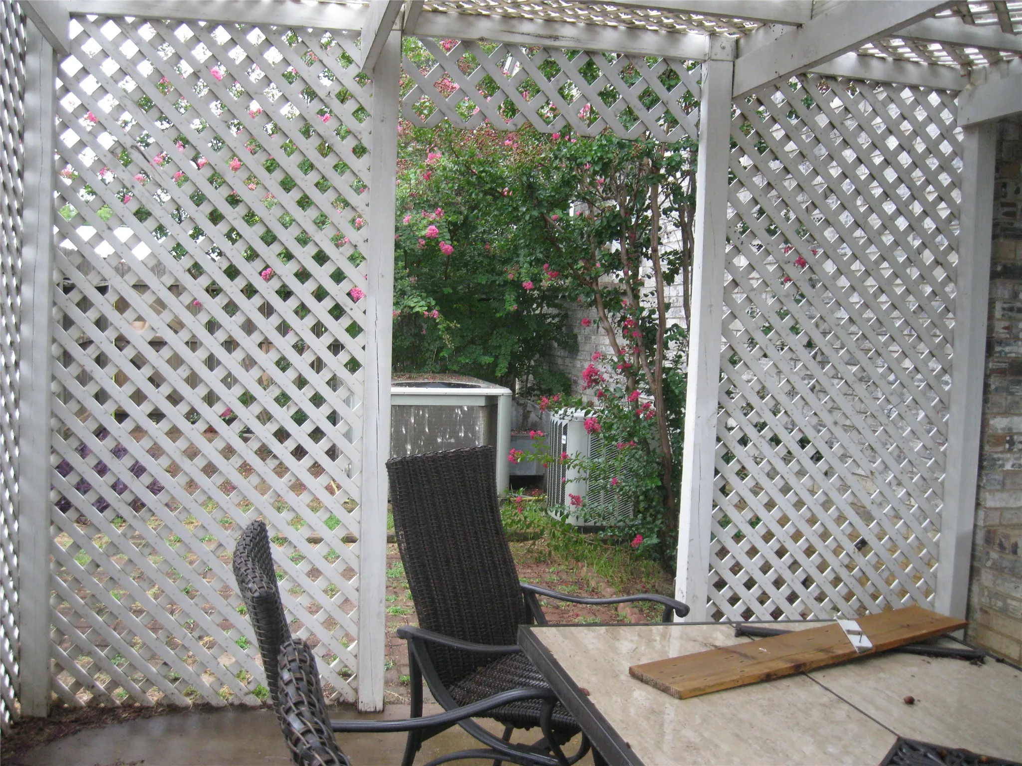 View of patio with a pergola and outdoor dining area