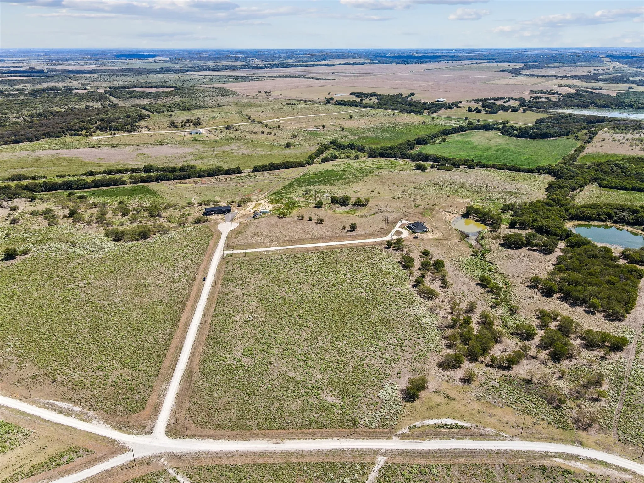 Bird's eye view featuring a water view and a rural view