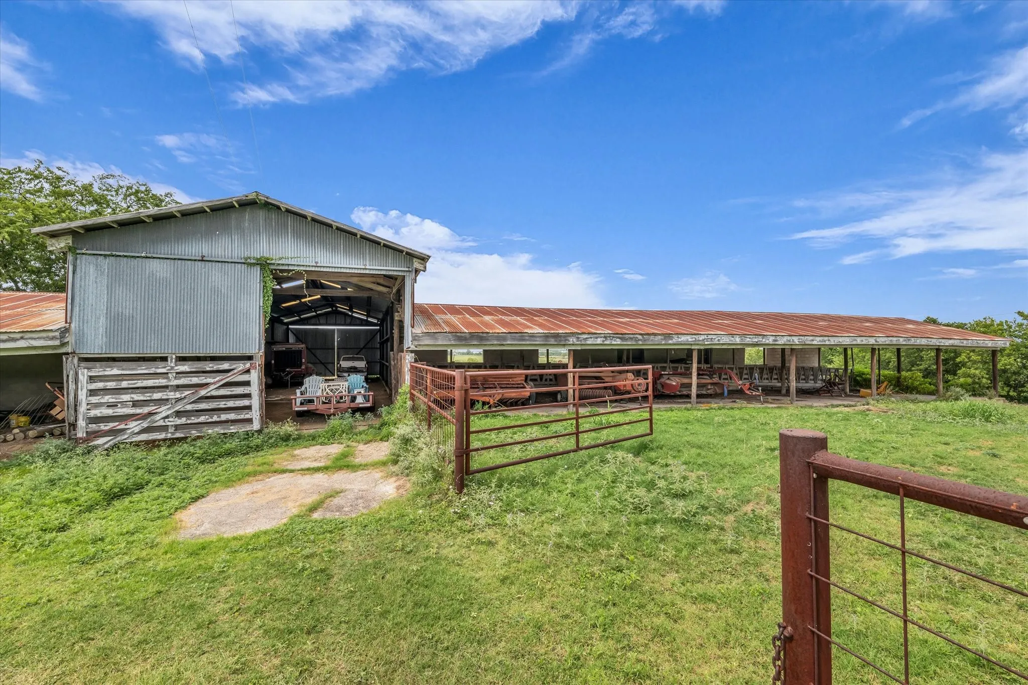 View of outbuilding with an exterior structure