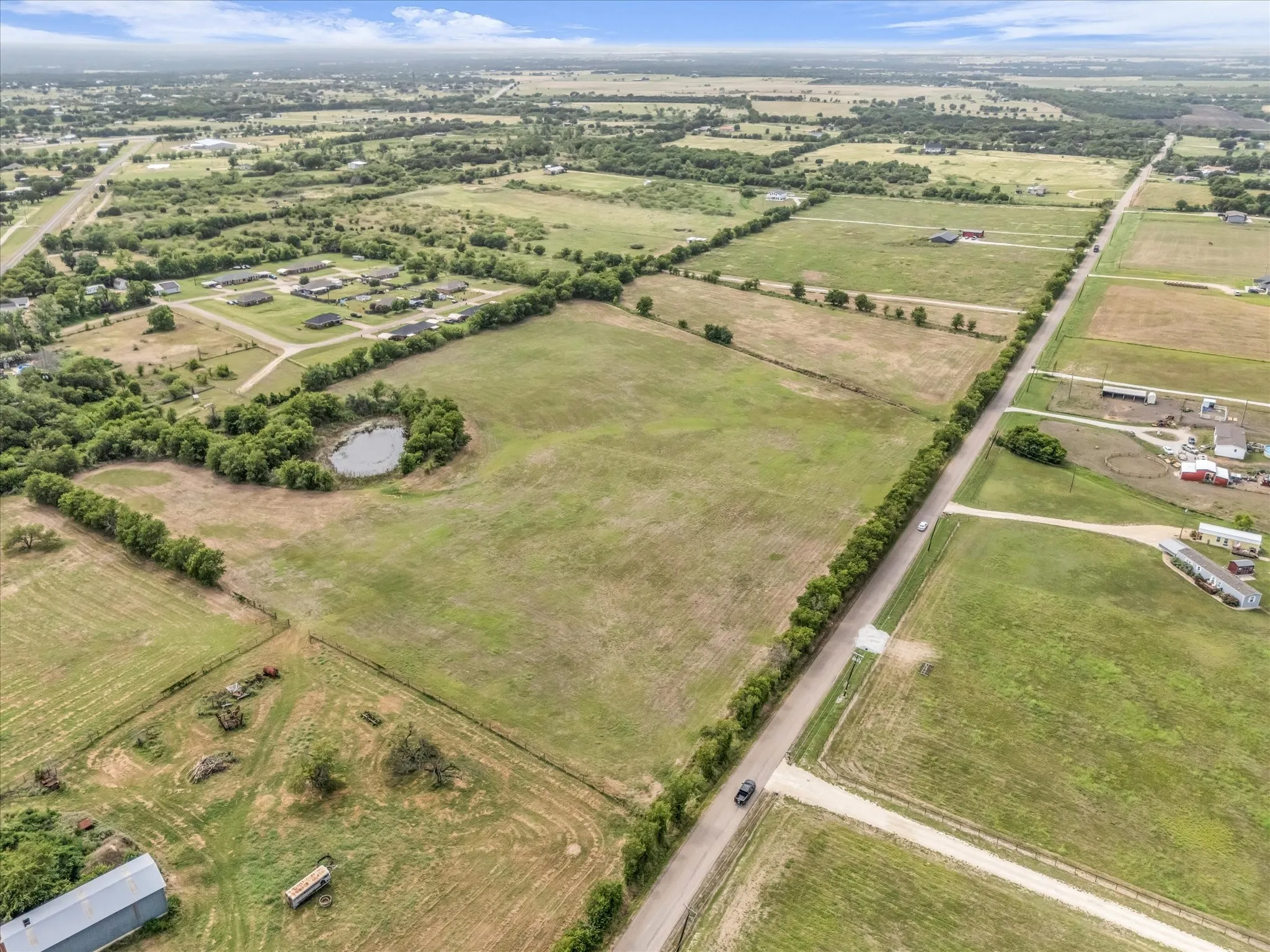 View of property location featuring rural landscape and agricultural land