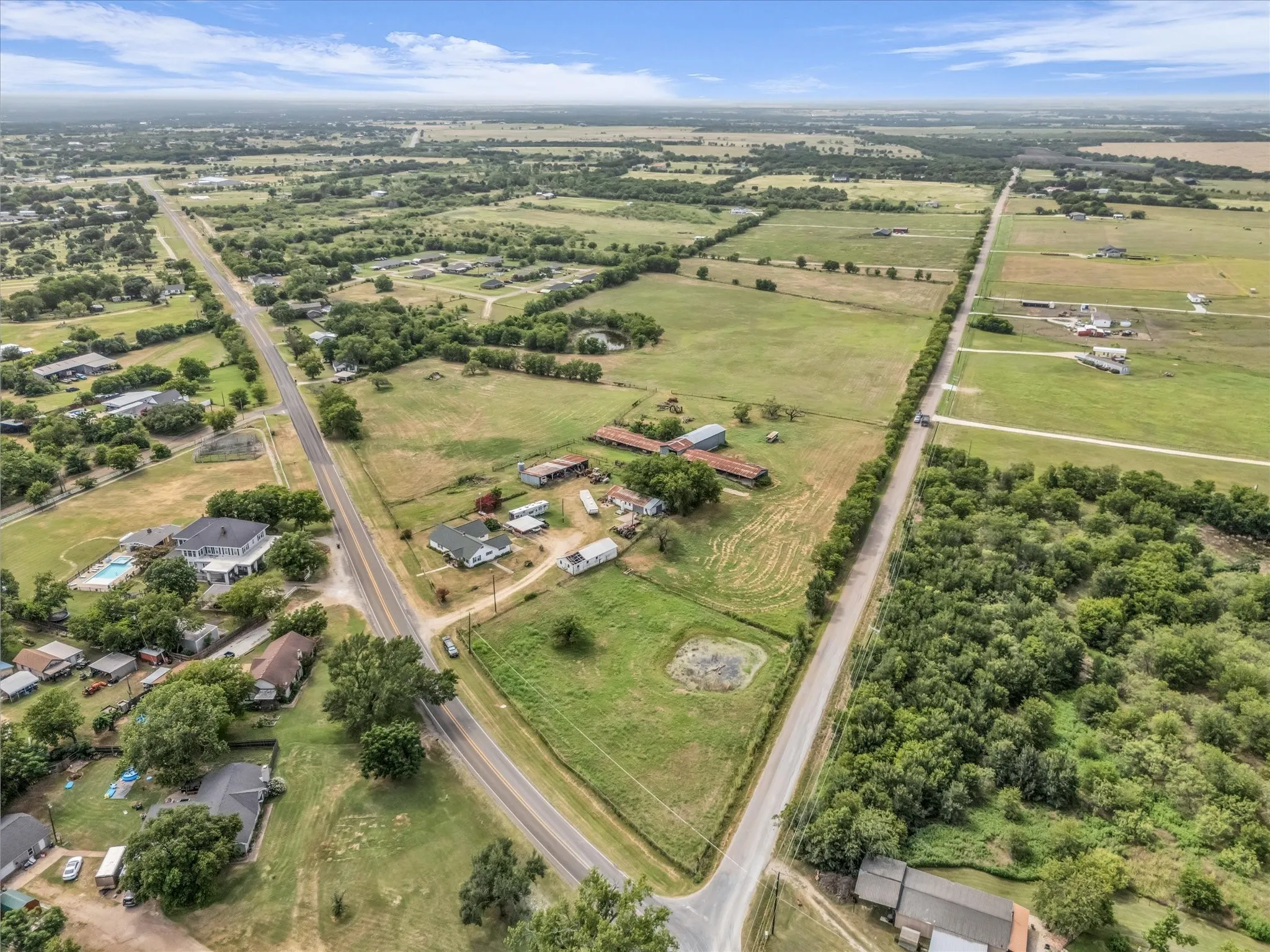 Aerial overview of property's location with rural landscape