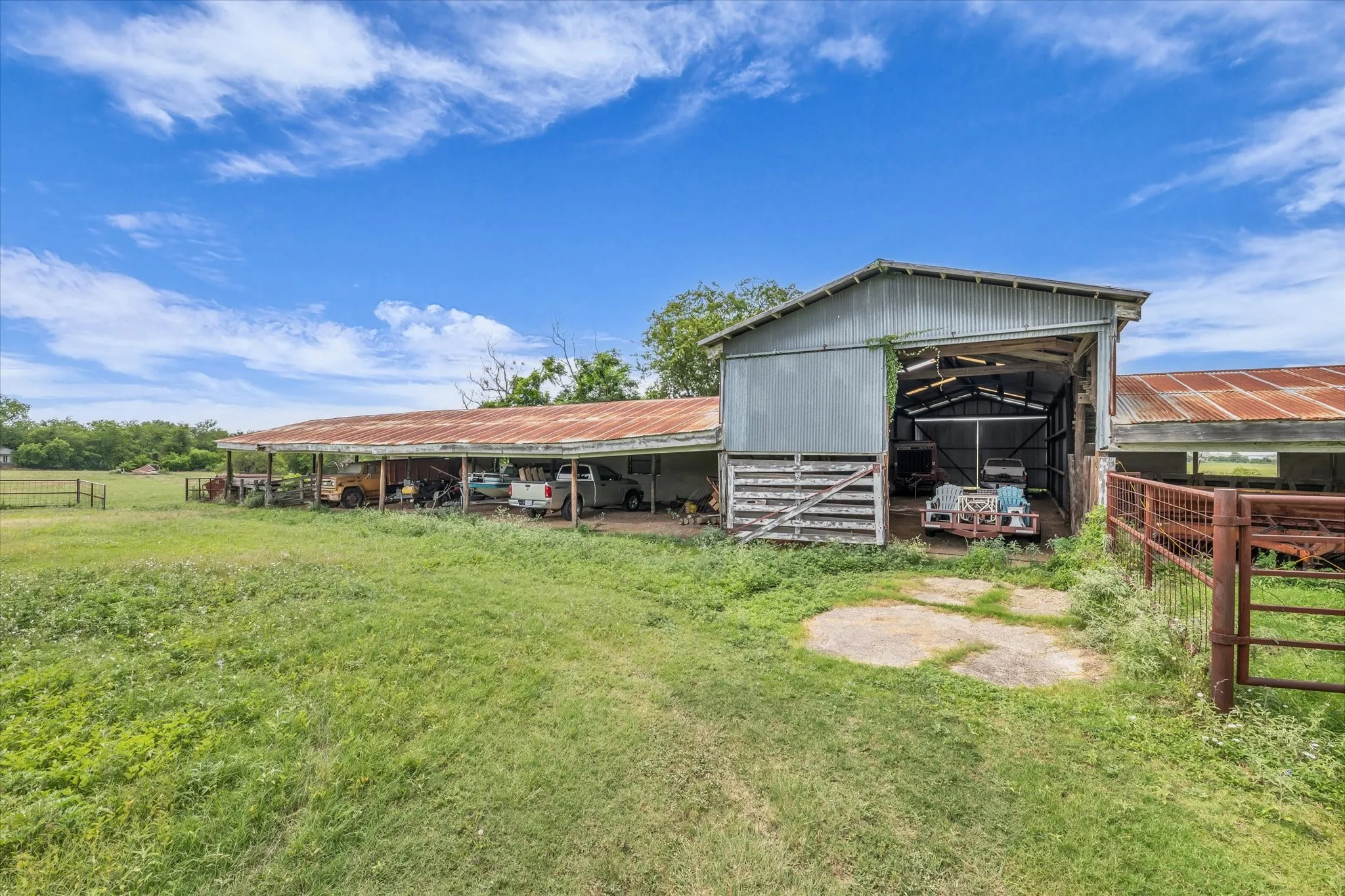 View of outbuilding with an exterior structure