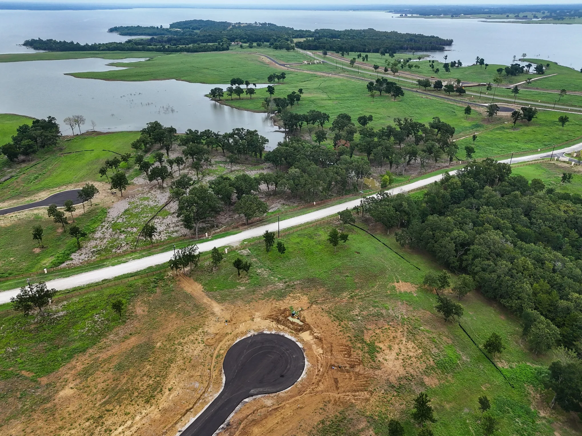 View of property location with a large body of water