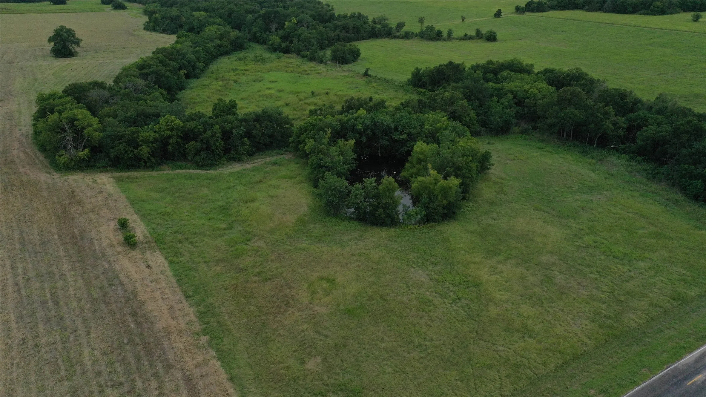 Aerial view of property's location featuring rural landscape