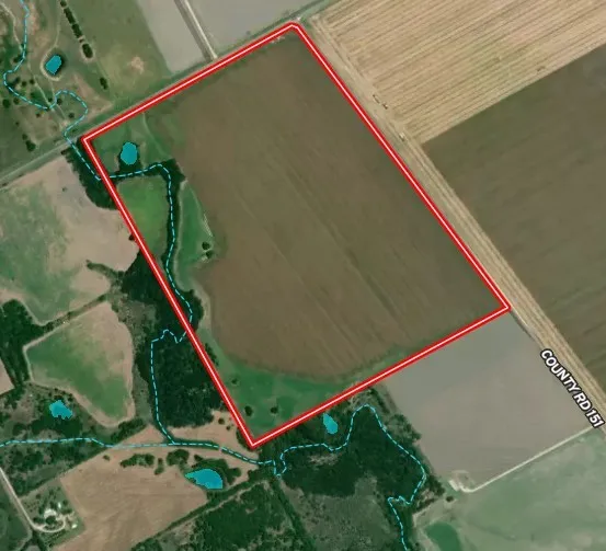 Aerial overview of property's location featuring property boundaries highlighted