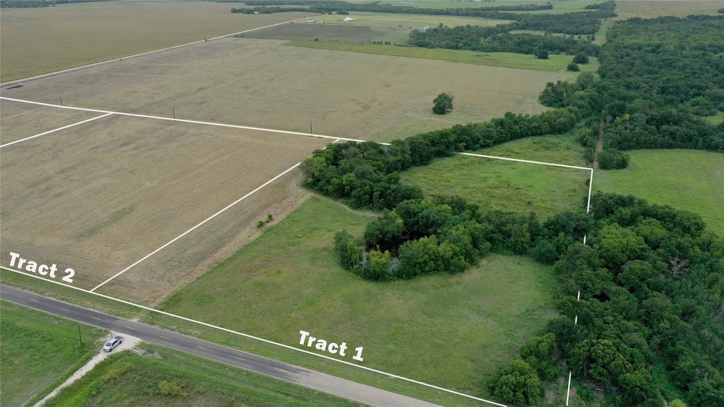 Aerial view of property and surrounding area with property boundaries highlighted and rural landscape