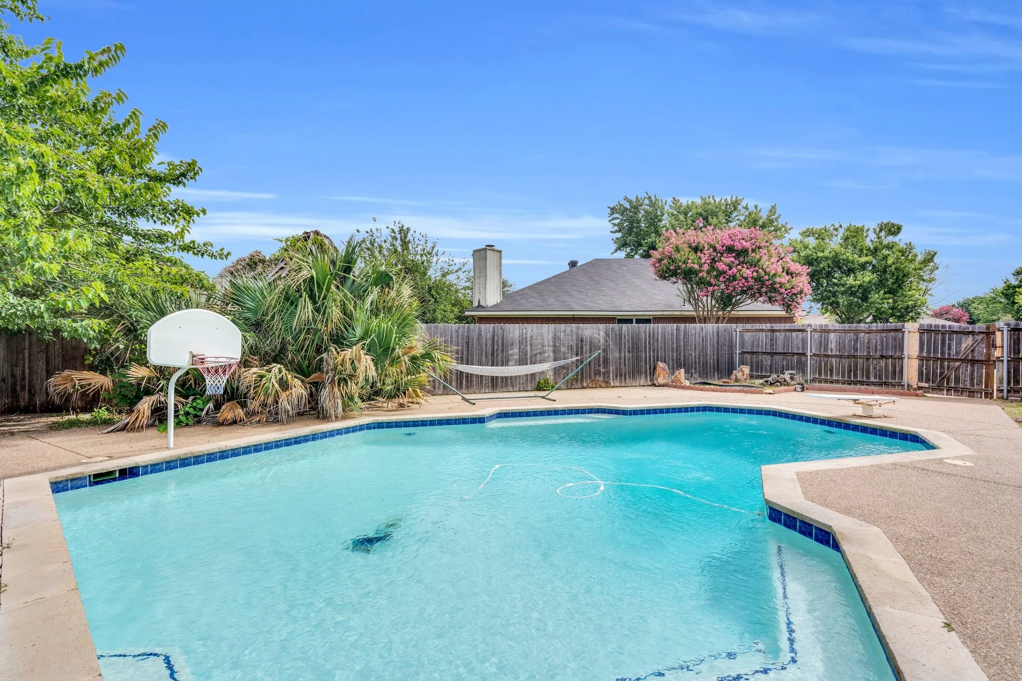 View of pool featuring a fenced backyard