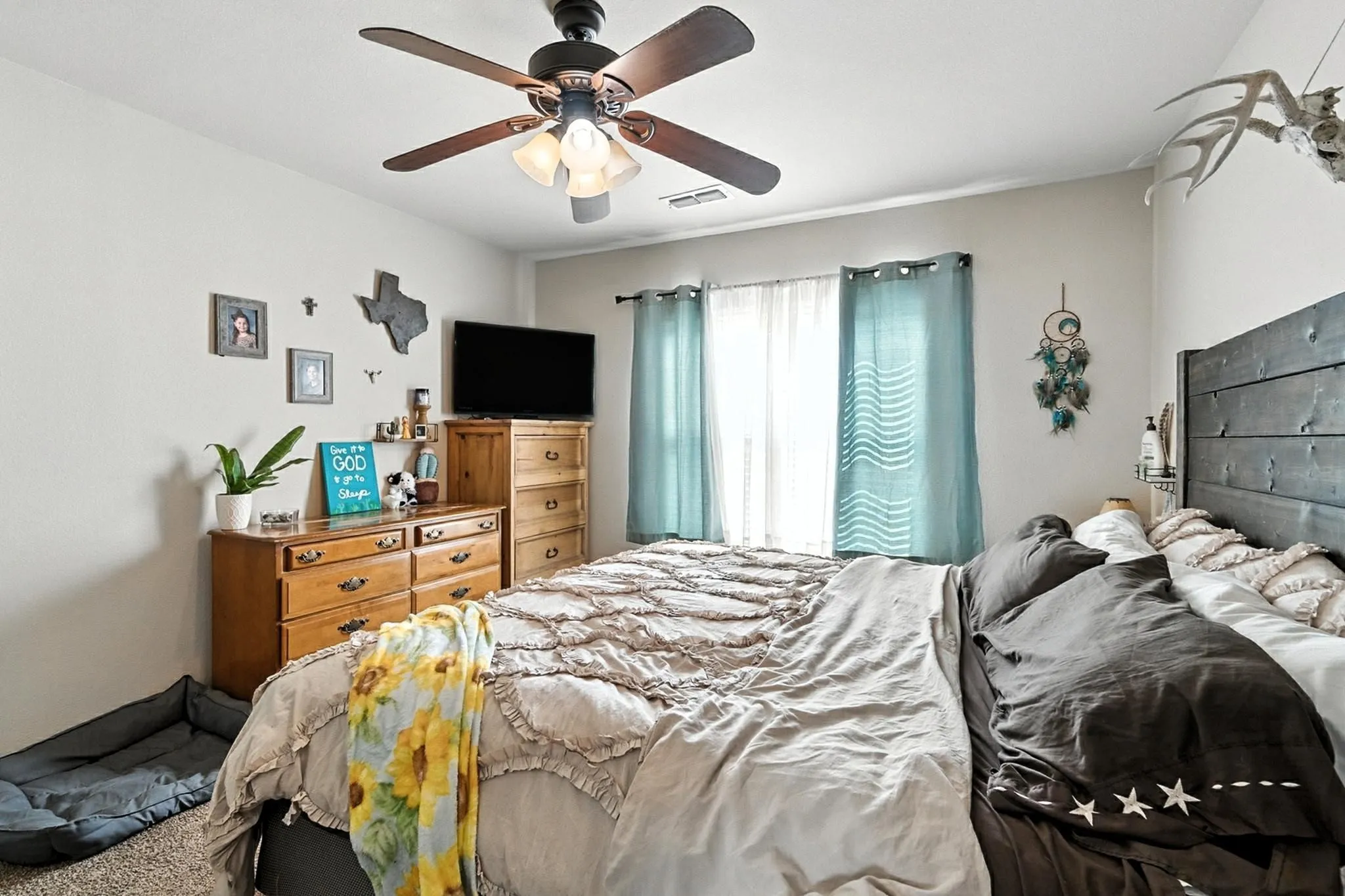 Bedroom featuring a ceiling fan