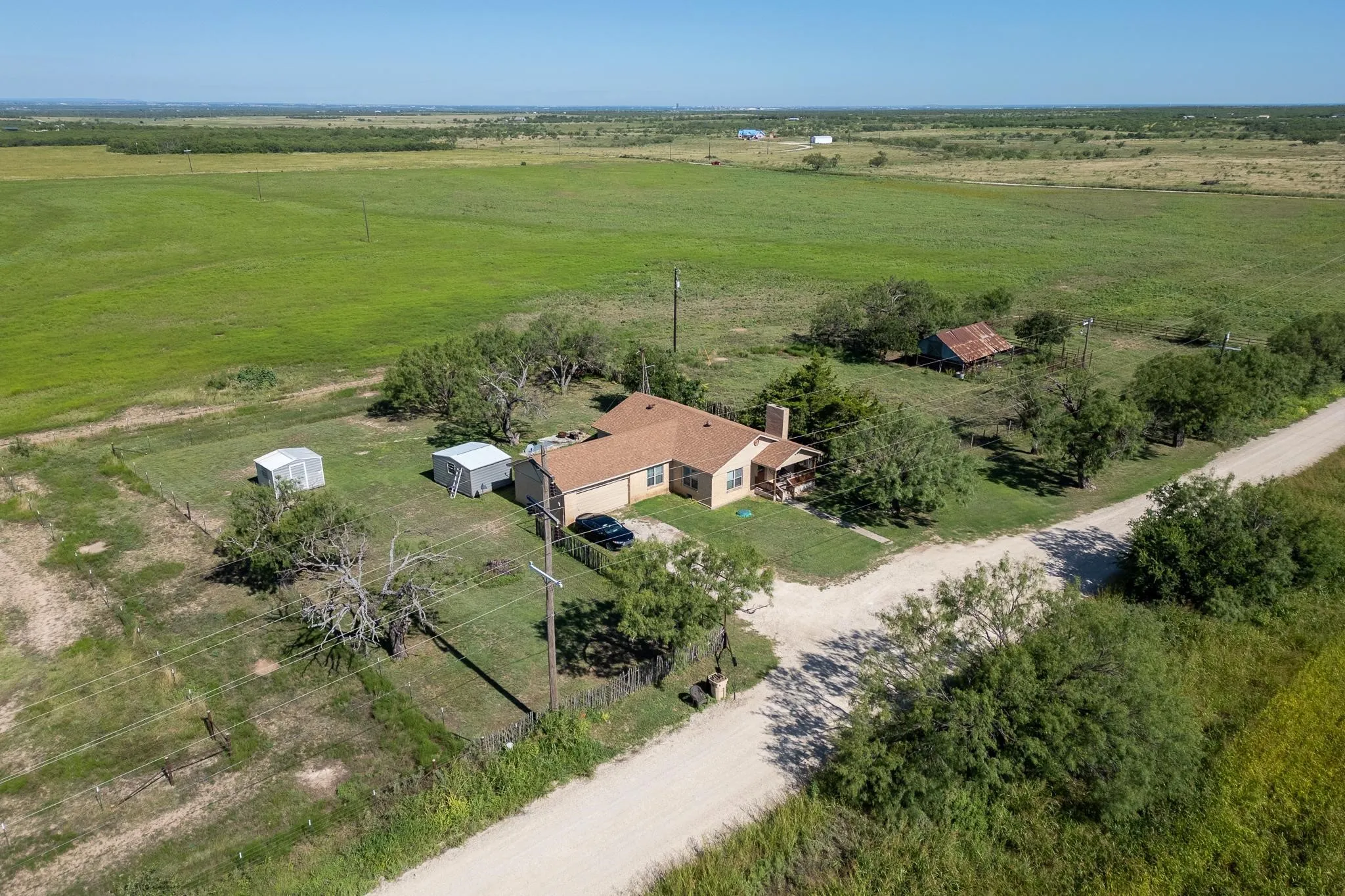 Aerial view of sparsely populated area featuring agricultural land