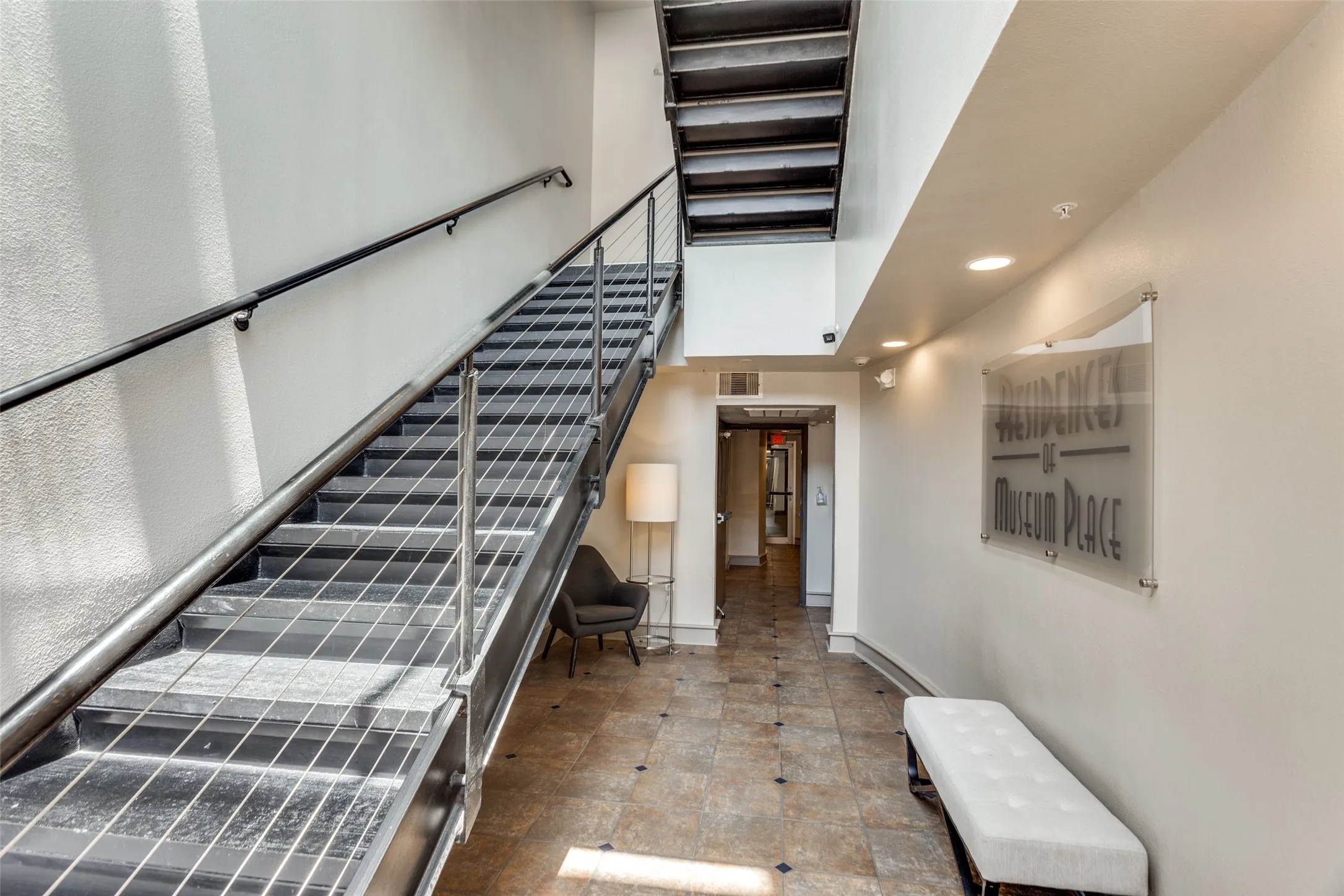 Visitors enter through the lobby and have the option of taking the stairs or elevator.