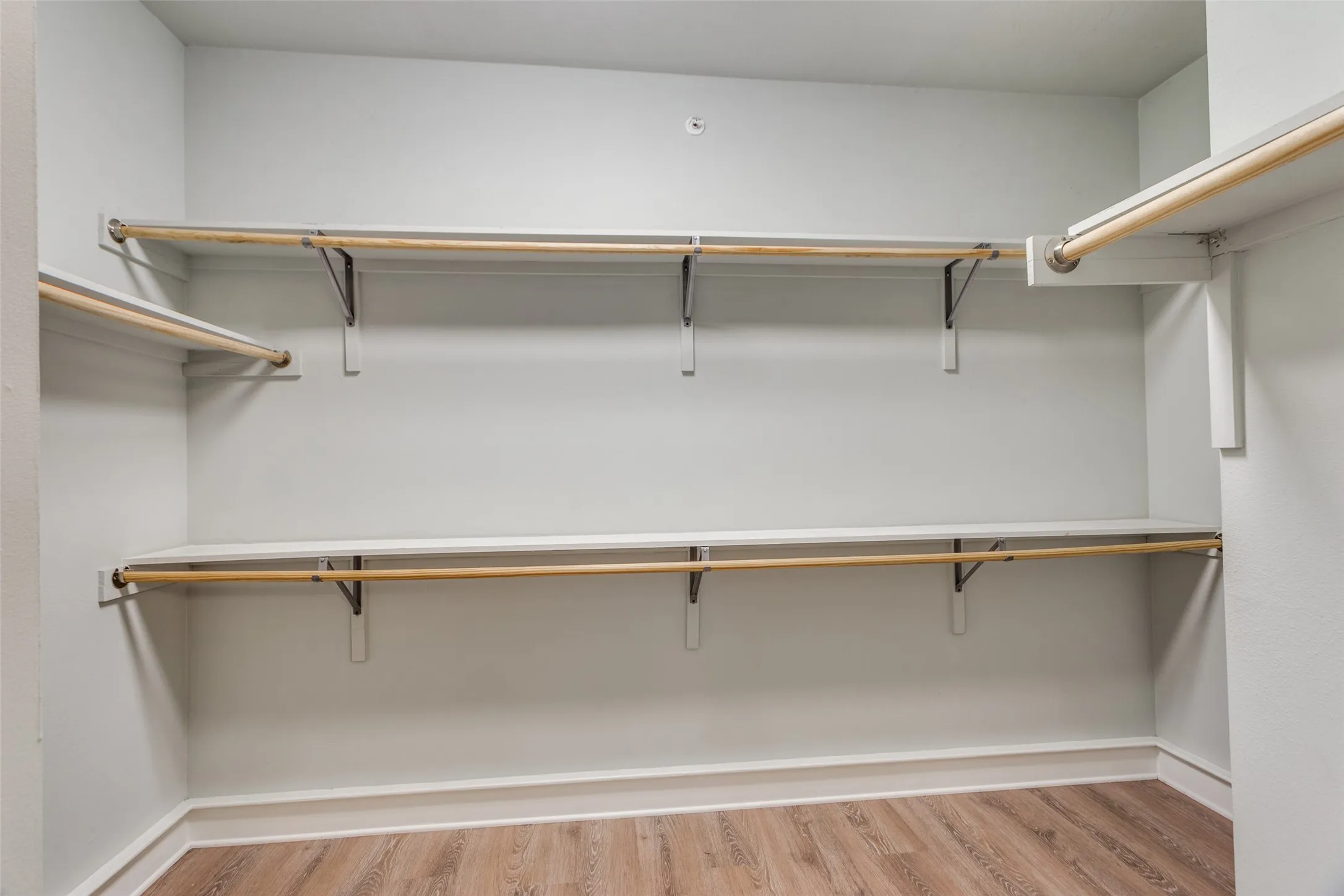 The walk-in closet is approximately 12 feet wide and 6 feet long.