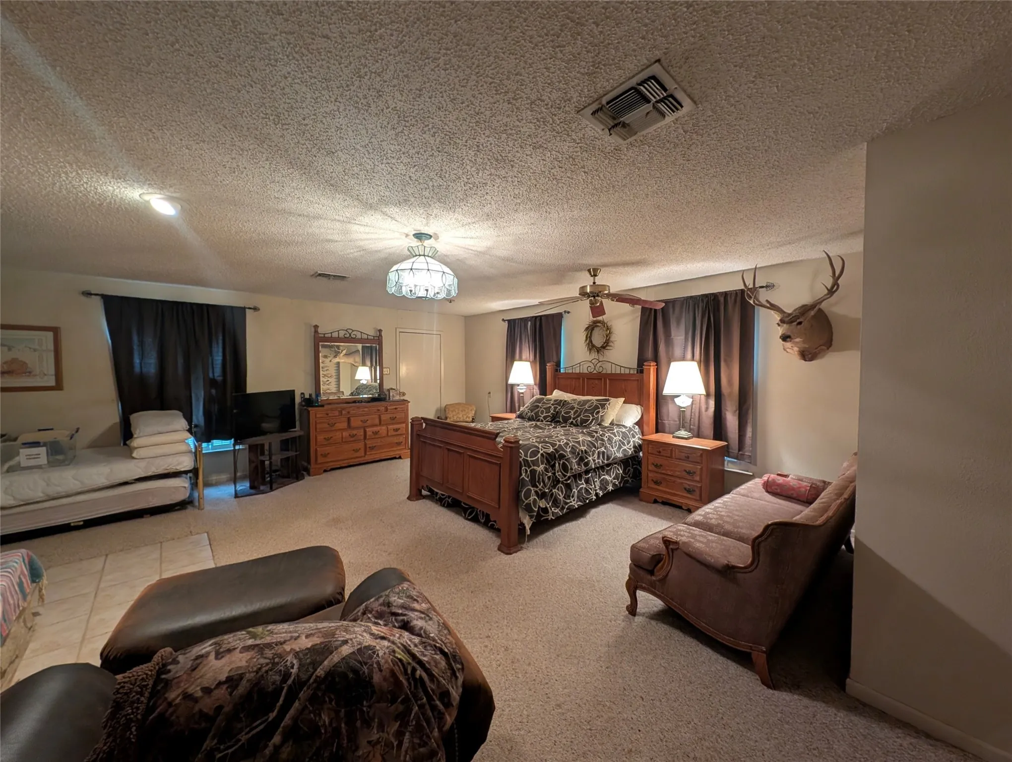 Master bedroom with fireplace and private full bath