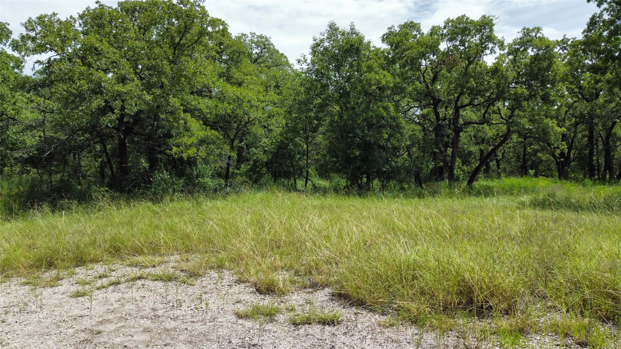 Unimproved Land For Sale in Wise County , n/a Comewell Court, Runaway Bay, Texas 76426, 0, 0, Garage spaces, 0 Sqft, built in 0, mls#20996399, Real Estate Agent in Runaway Bay, Homes For Sale in Wise county, Homes For Sale in Runaway Bay, Realtor in Runaway Bay Texas, Real Estate Brokerage Independent Realty Texas, Luminita Cordes Realtor