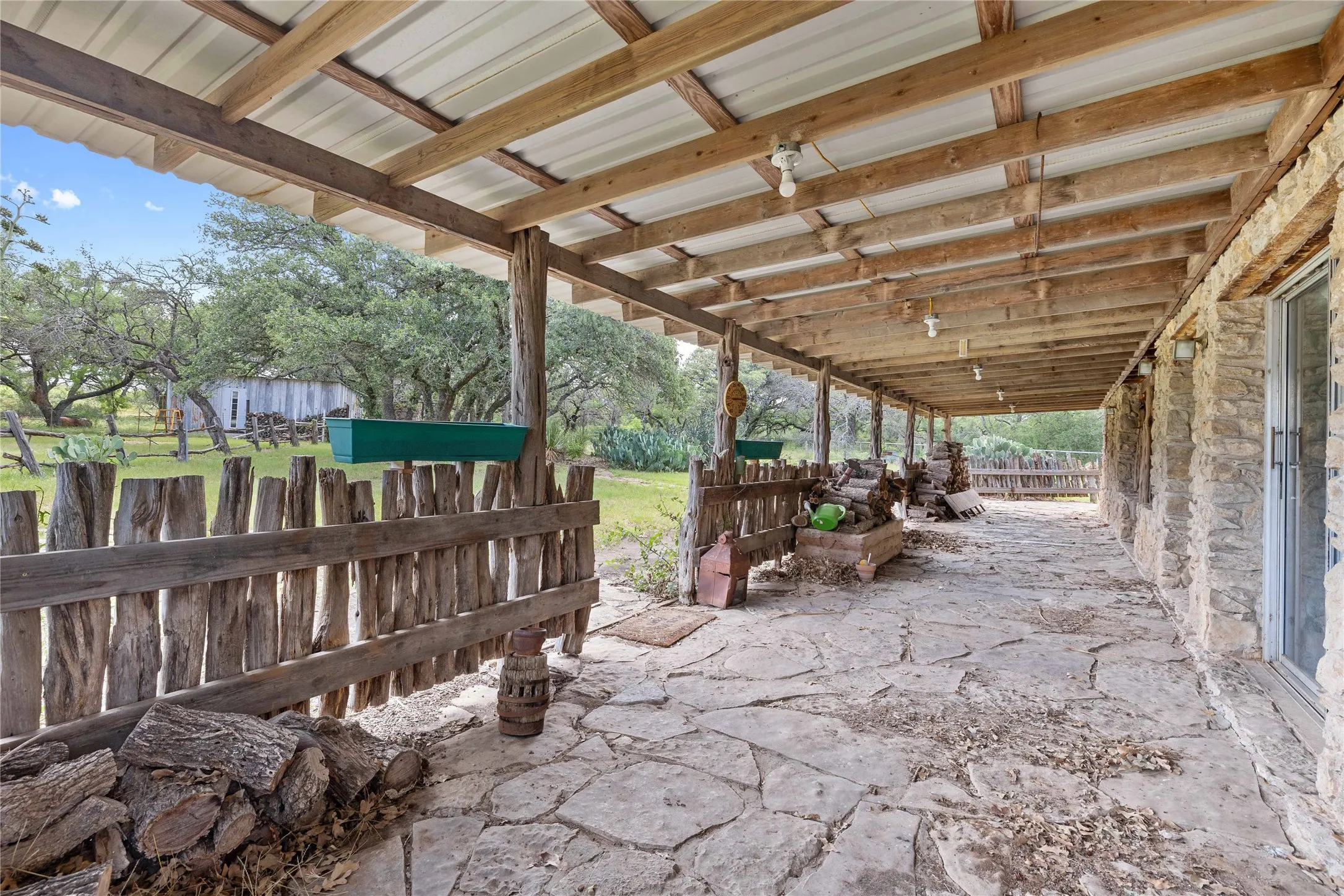 View of patio / terrace featuring an exterior structure and an outdoor structure