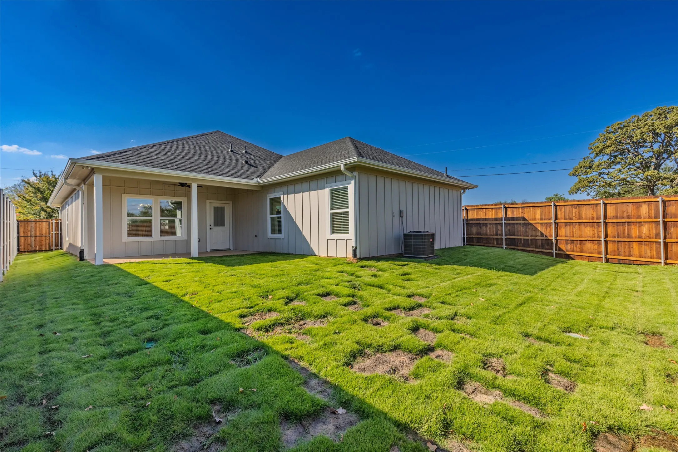 Yard has sod and sprinkler system