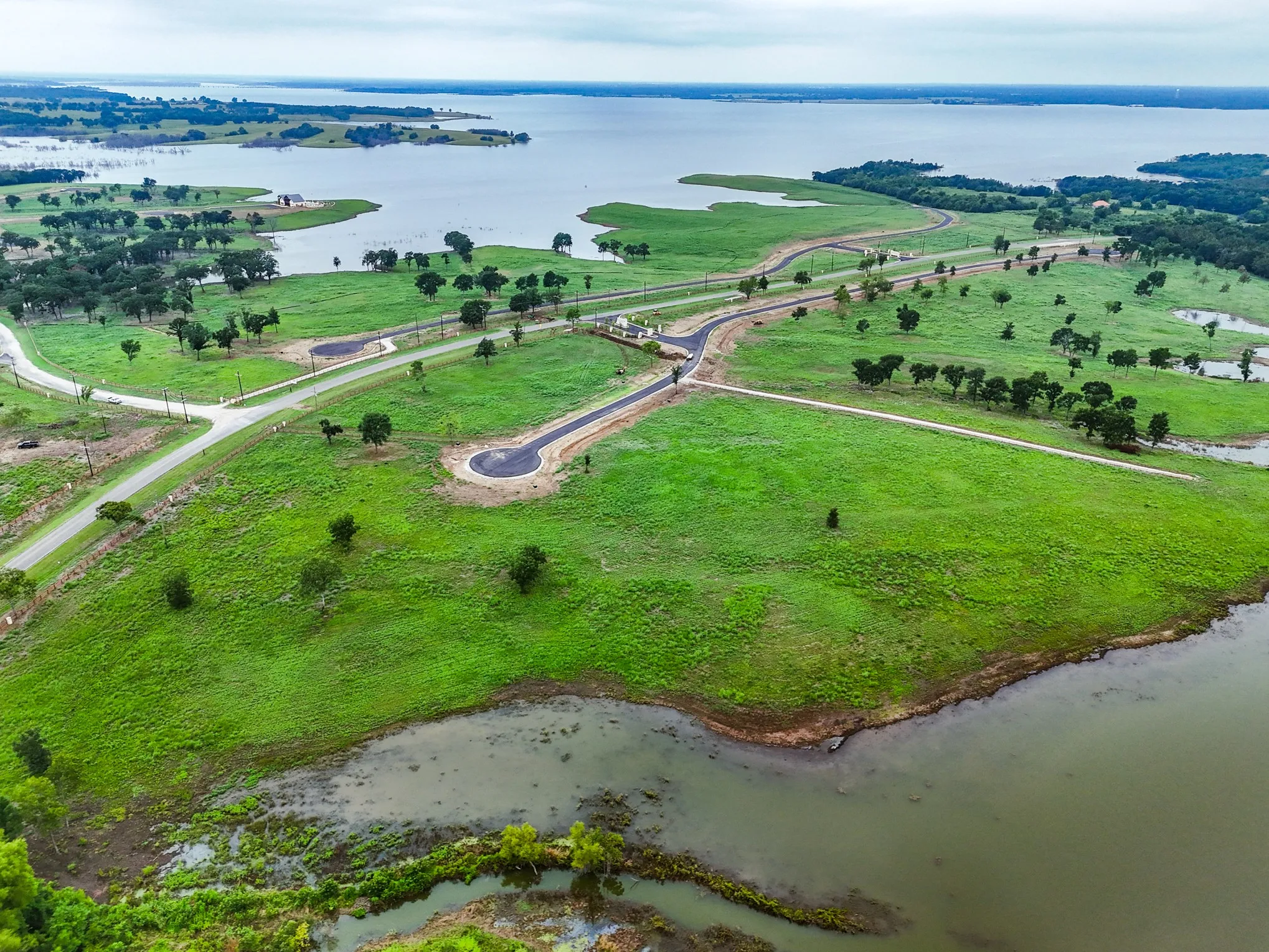 View of property location with a nearby body of water