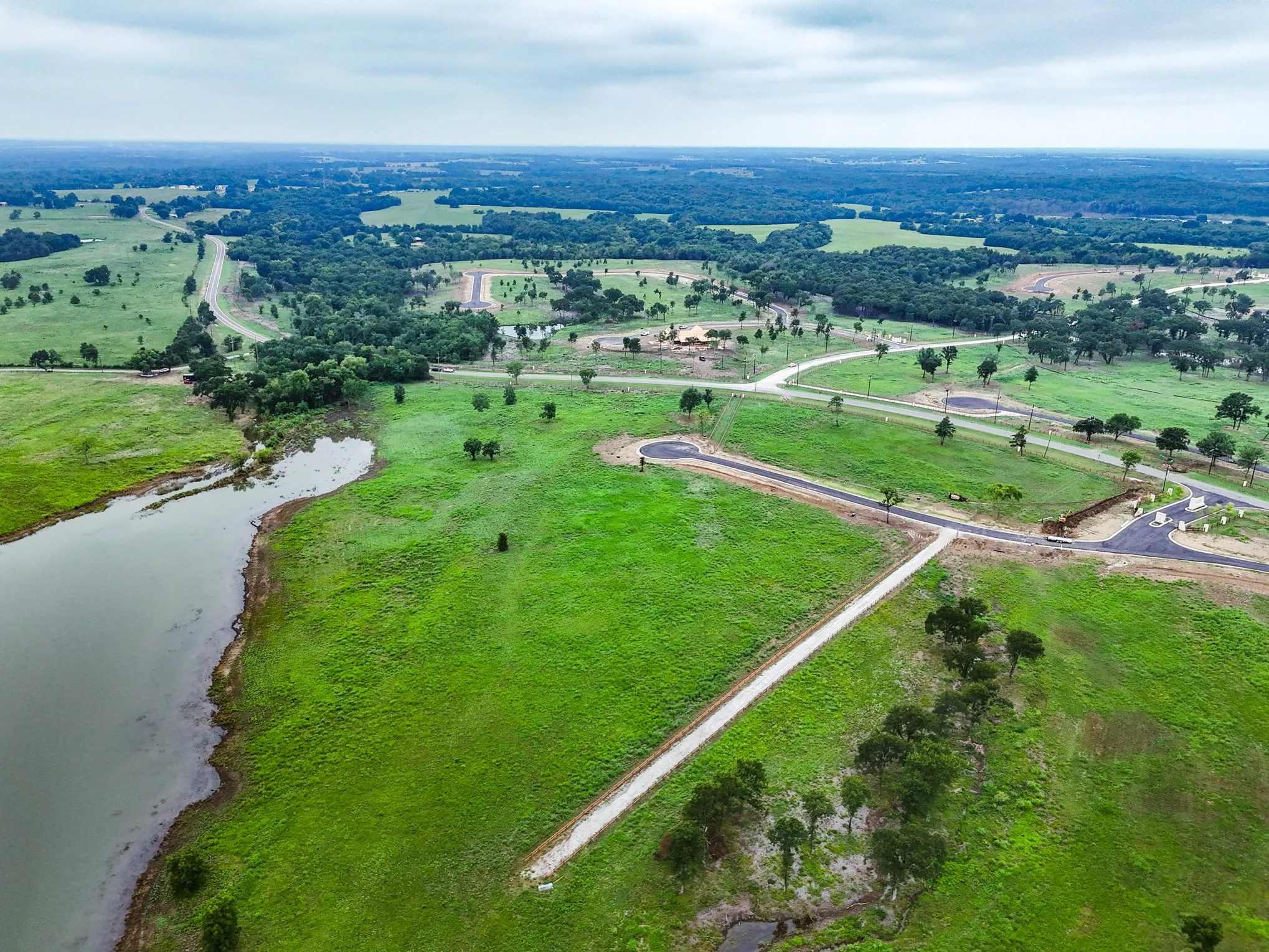 View of rural area with a nearby body of water