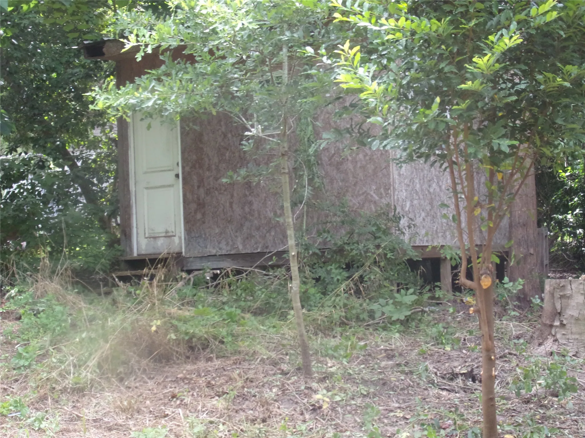 View of outbuilding at back of property