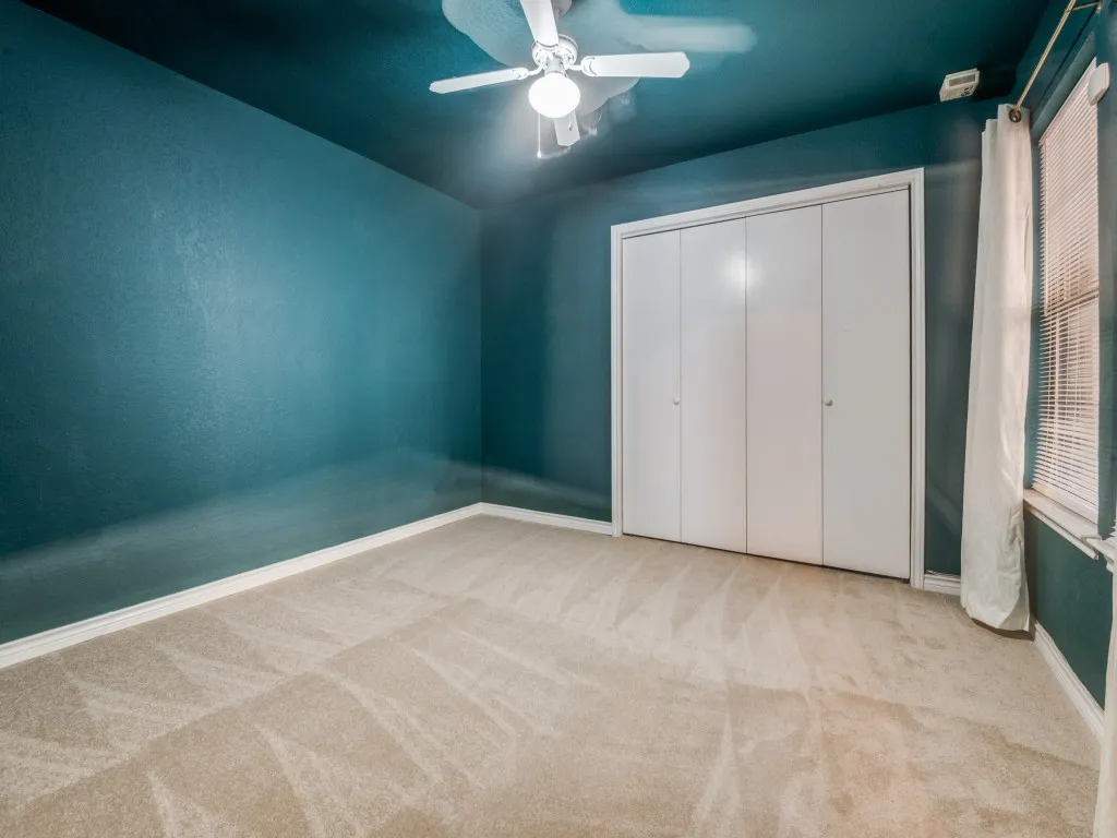 Downstairs bedroom, newly carpeted.