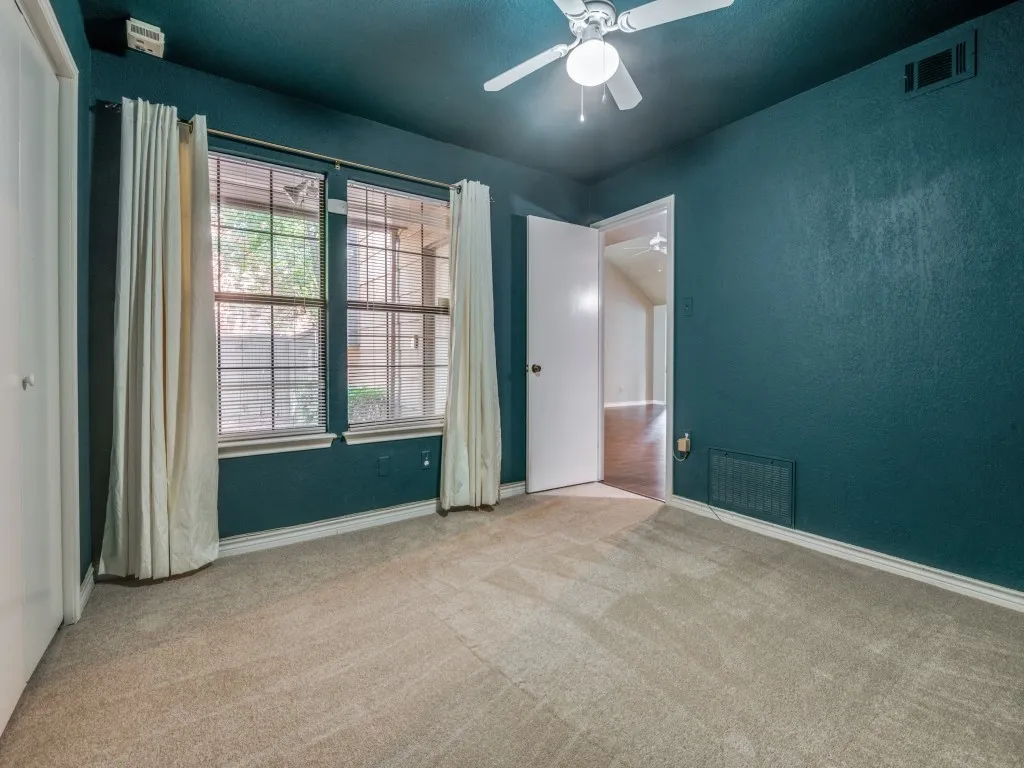 New carpet in downstairs bedroom.