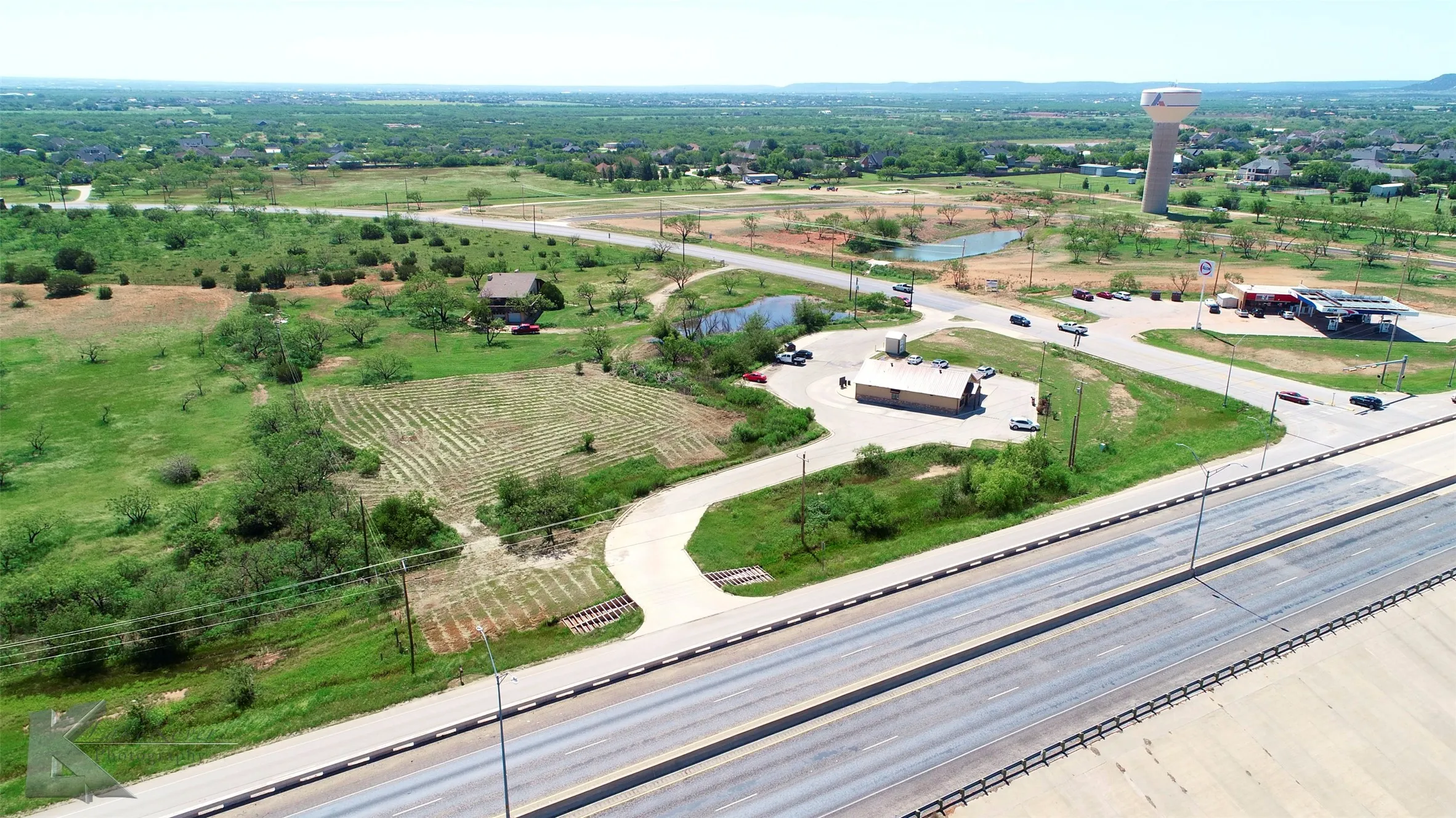 View of rural area with a nearby body of water