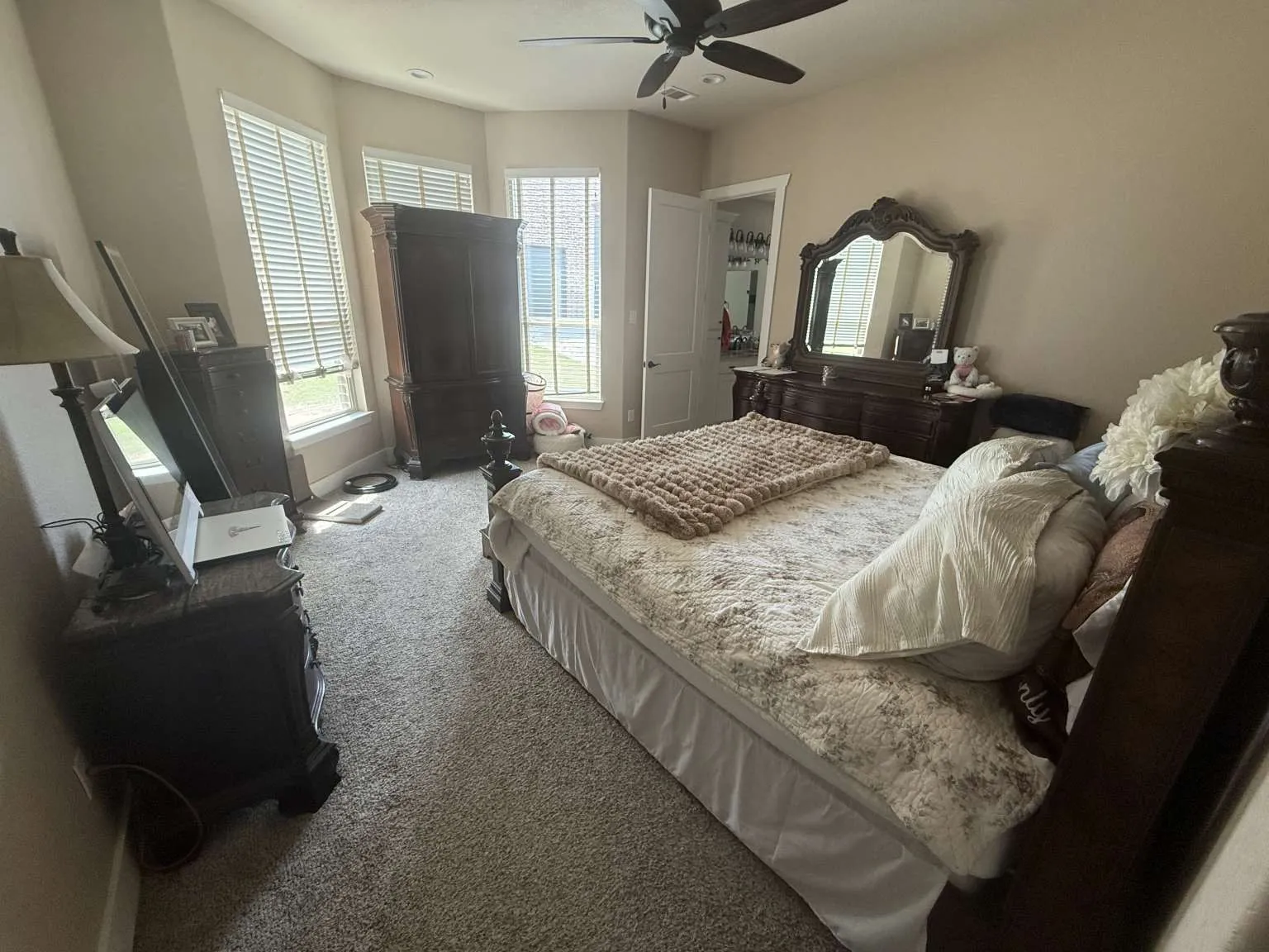 Bedroom featuring carpet floors and a ceiling fan