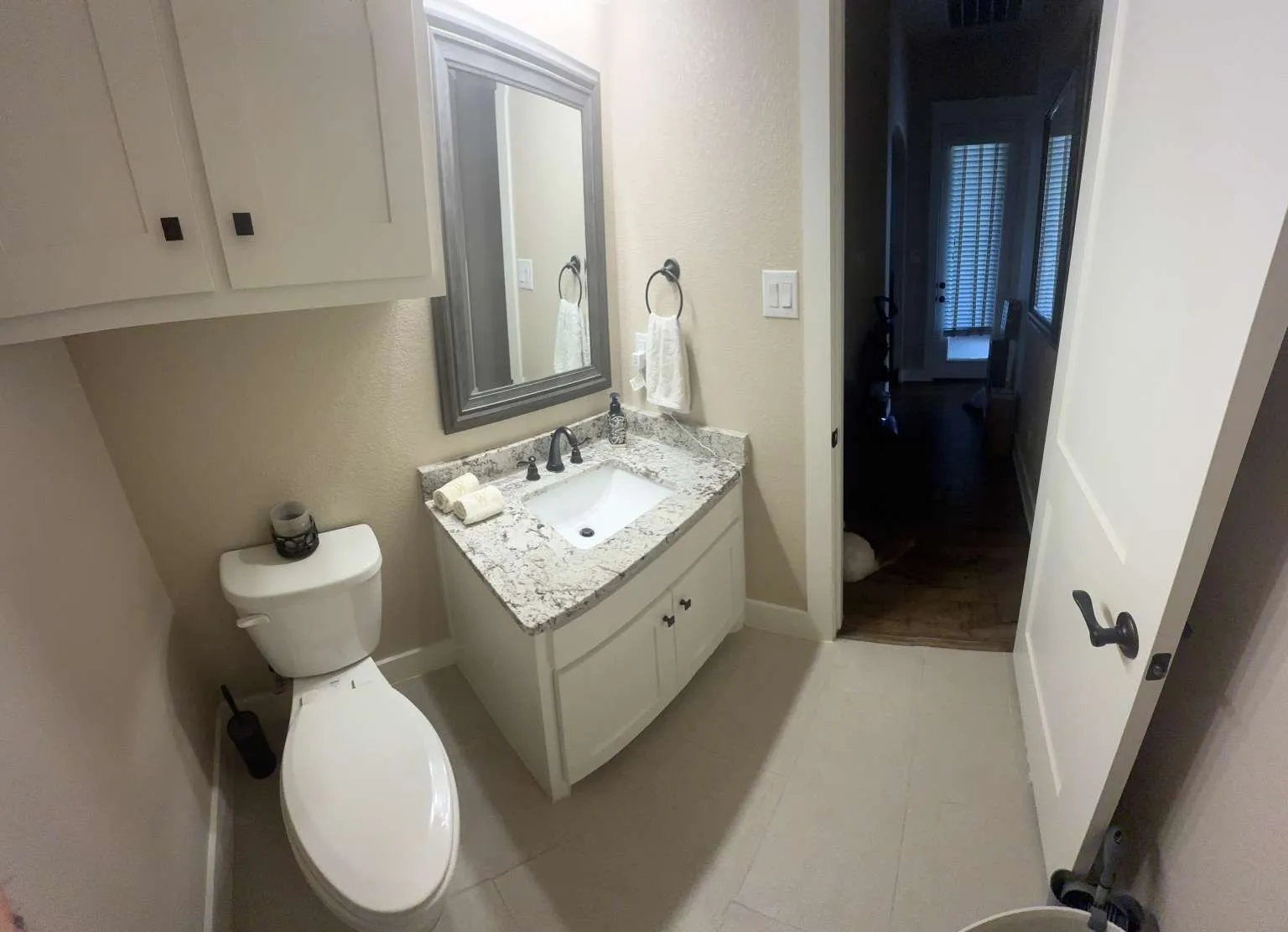 Bathroom with vanity and tile patterned floors