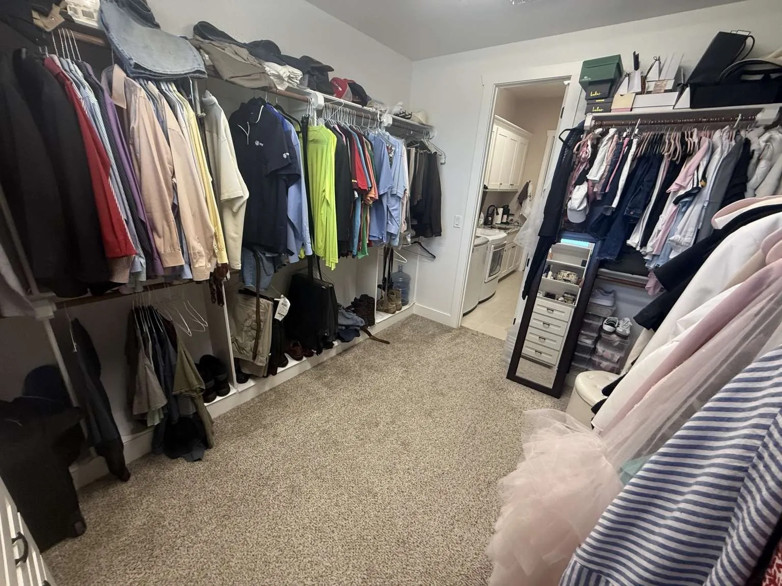 Spacious closet with carpet flooring