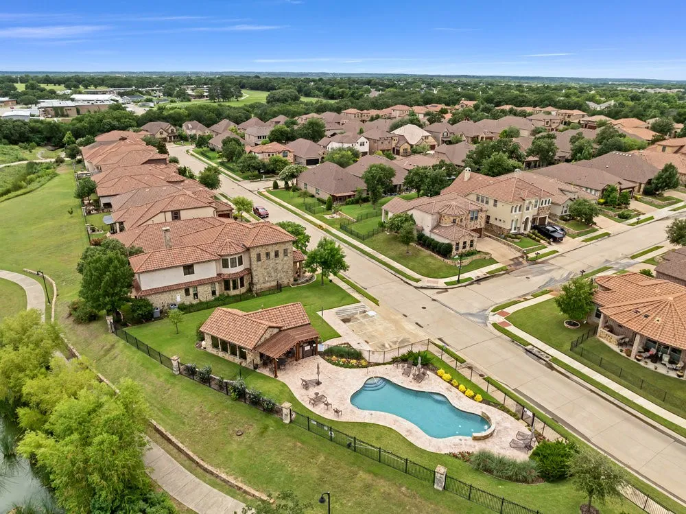 Aerial view of residential area with a pool area