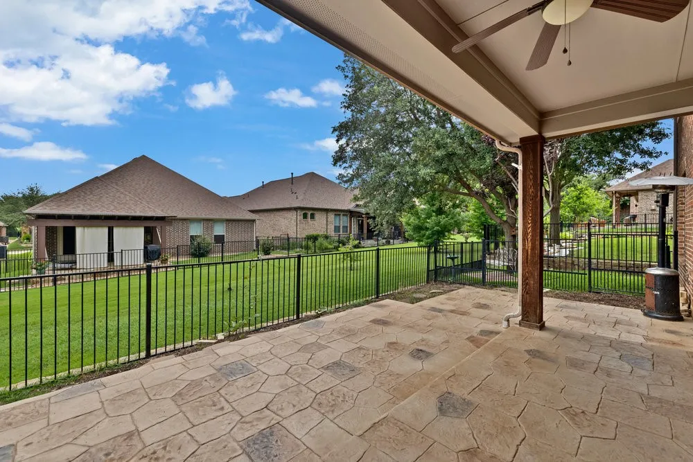 View of patio featuring a ceiling fan