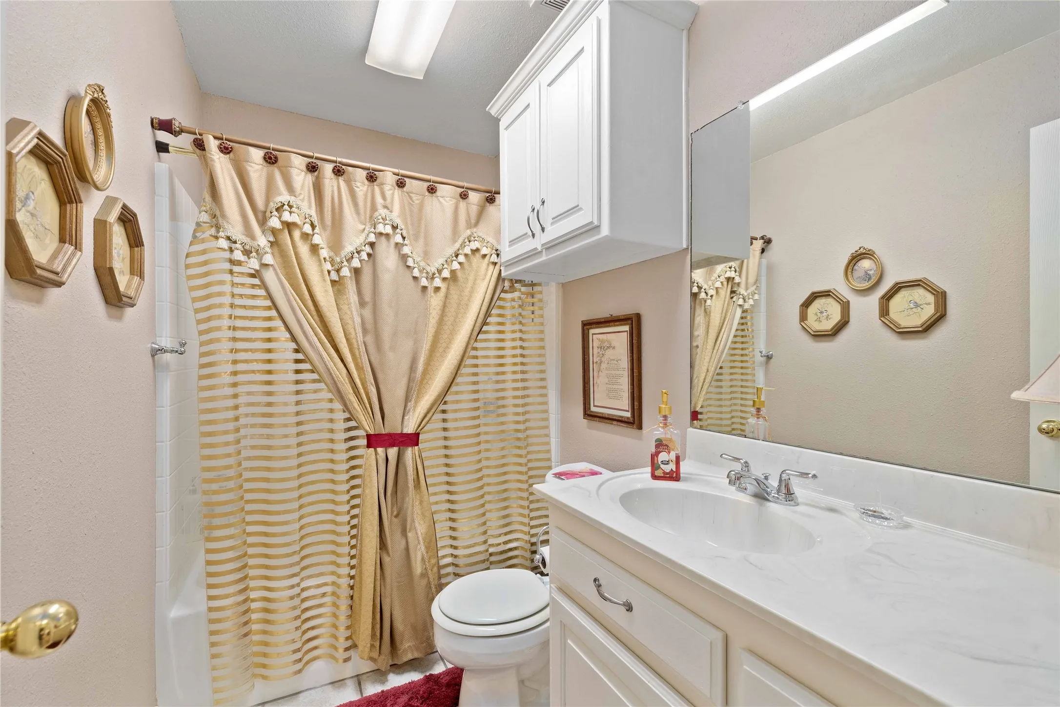 Main bathroom with tub and shower
