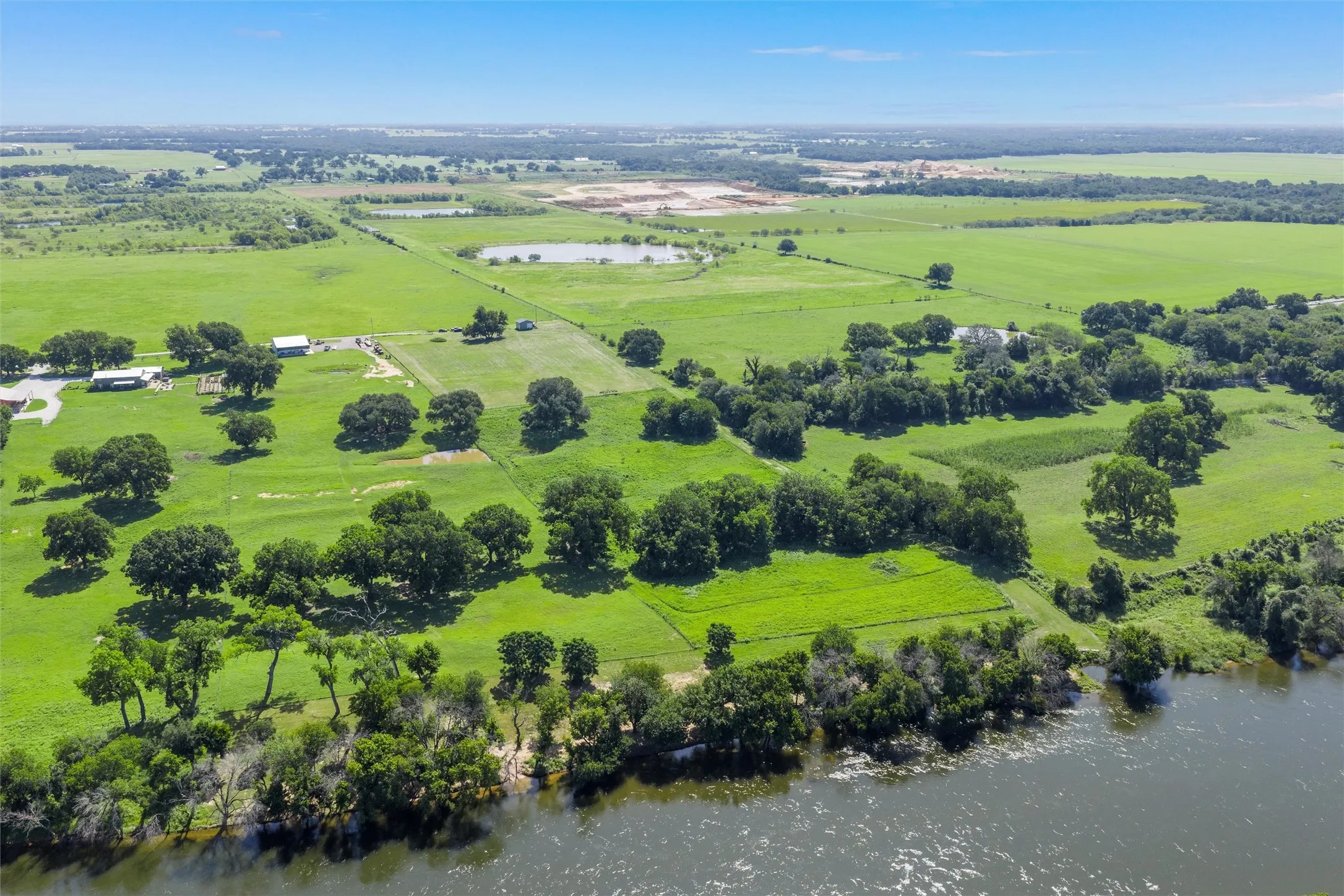 Overview of rural landscape with a large body of water