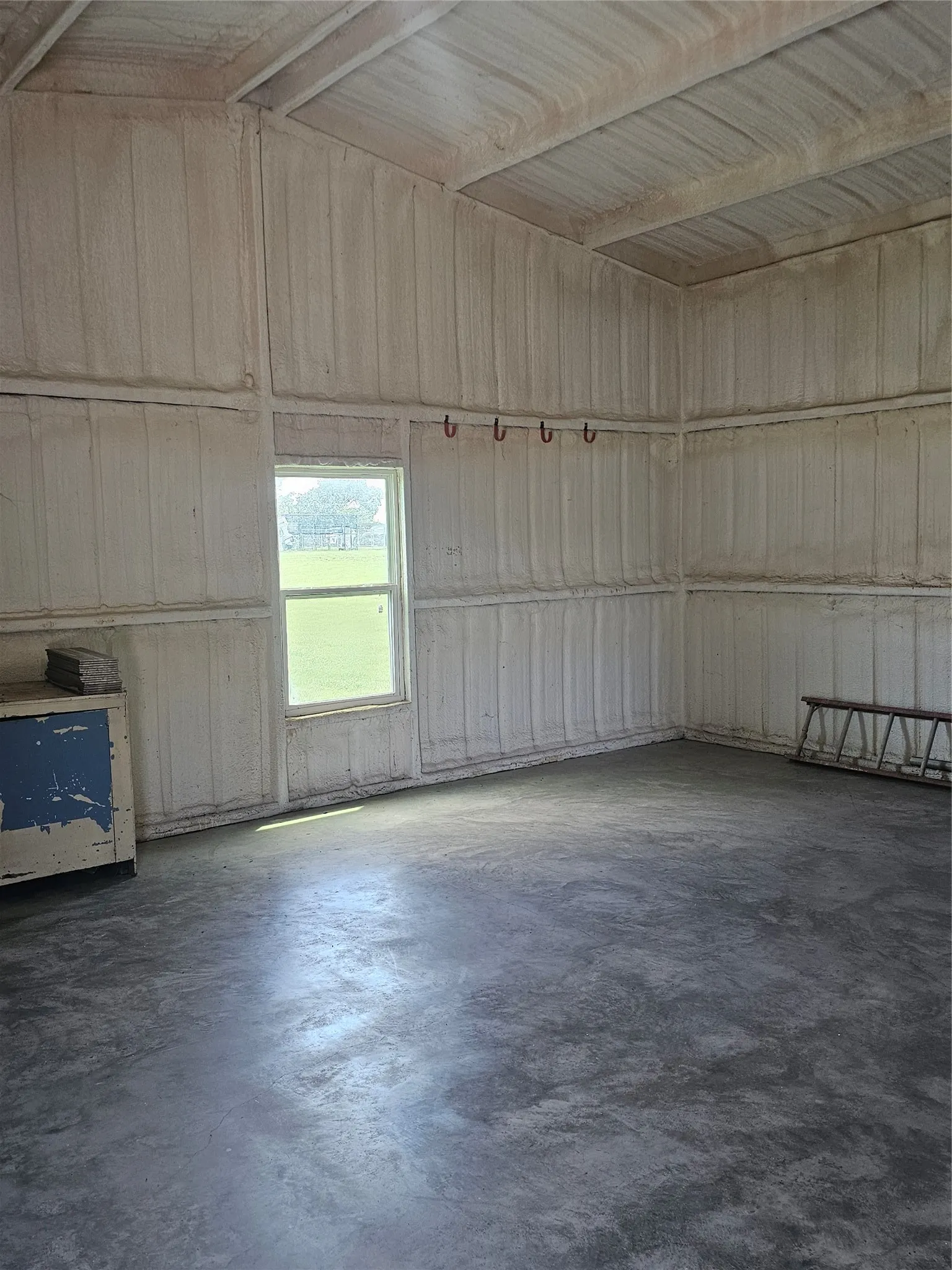 24x24 shop with electricity and foam insulation, 1 overhead door.