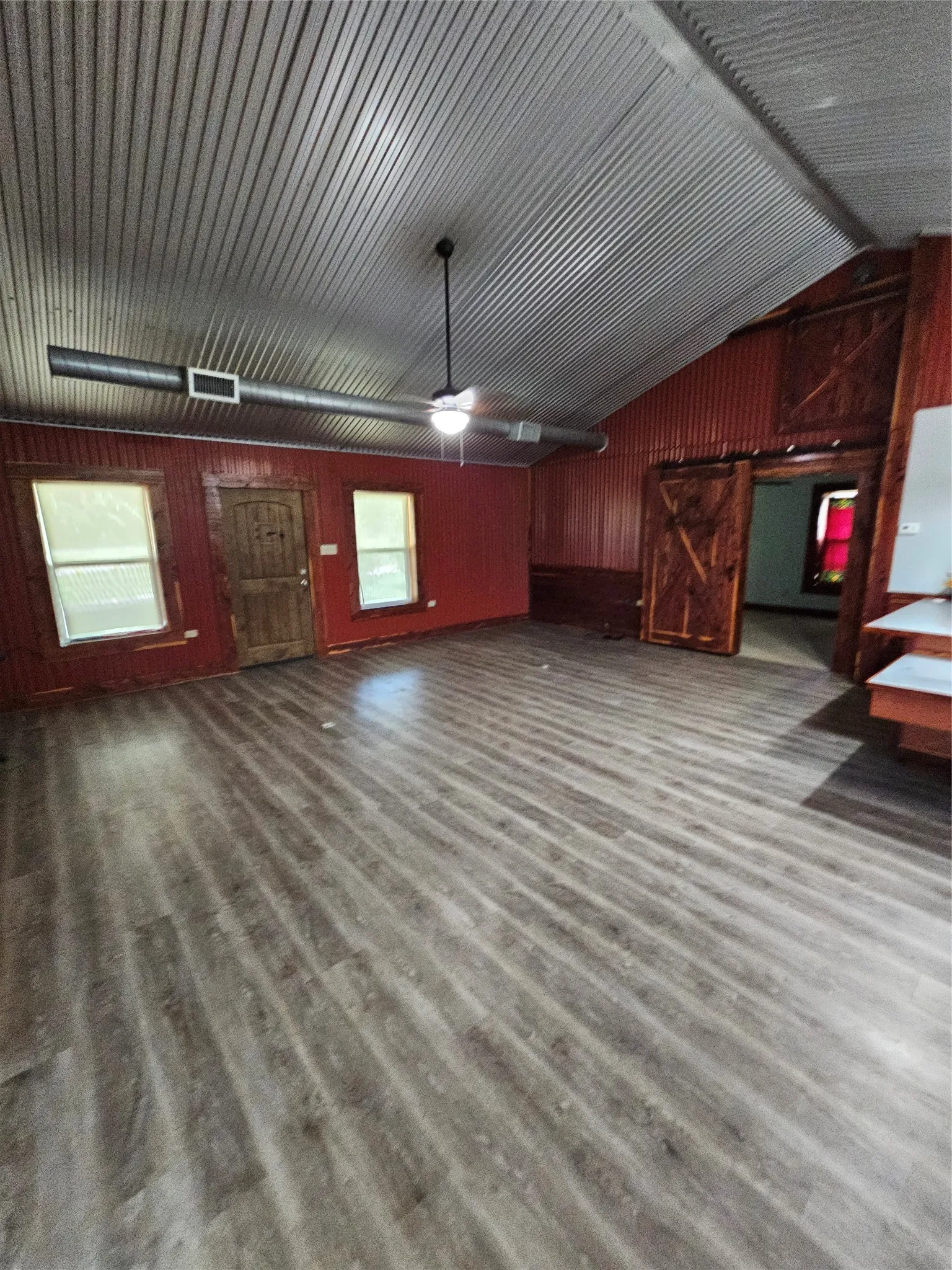 Living room with vaulted ceiling