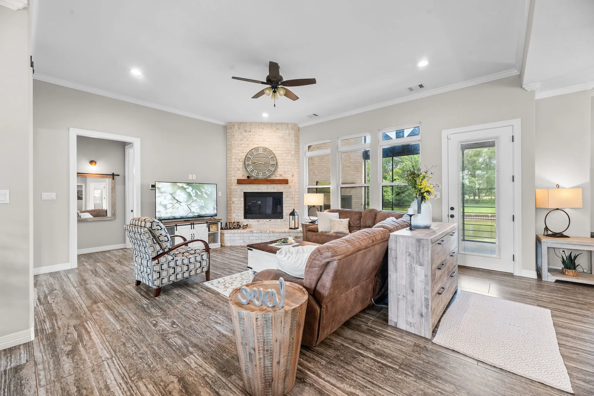 The bright and open living area shows off lake views from the minute you walk in...begging you to step outside!
