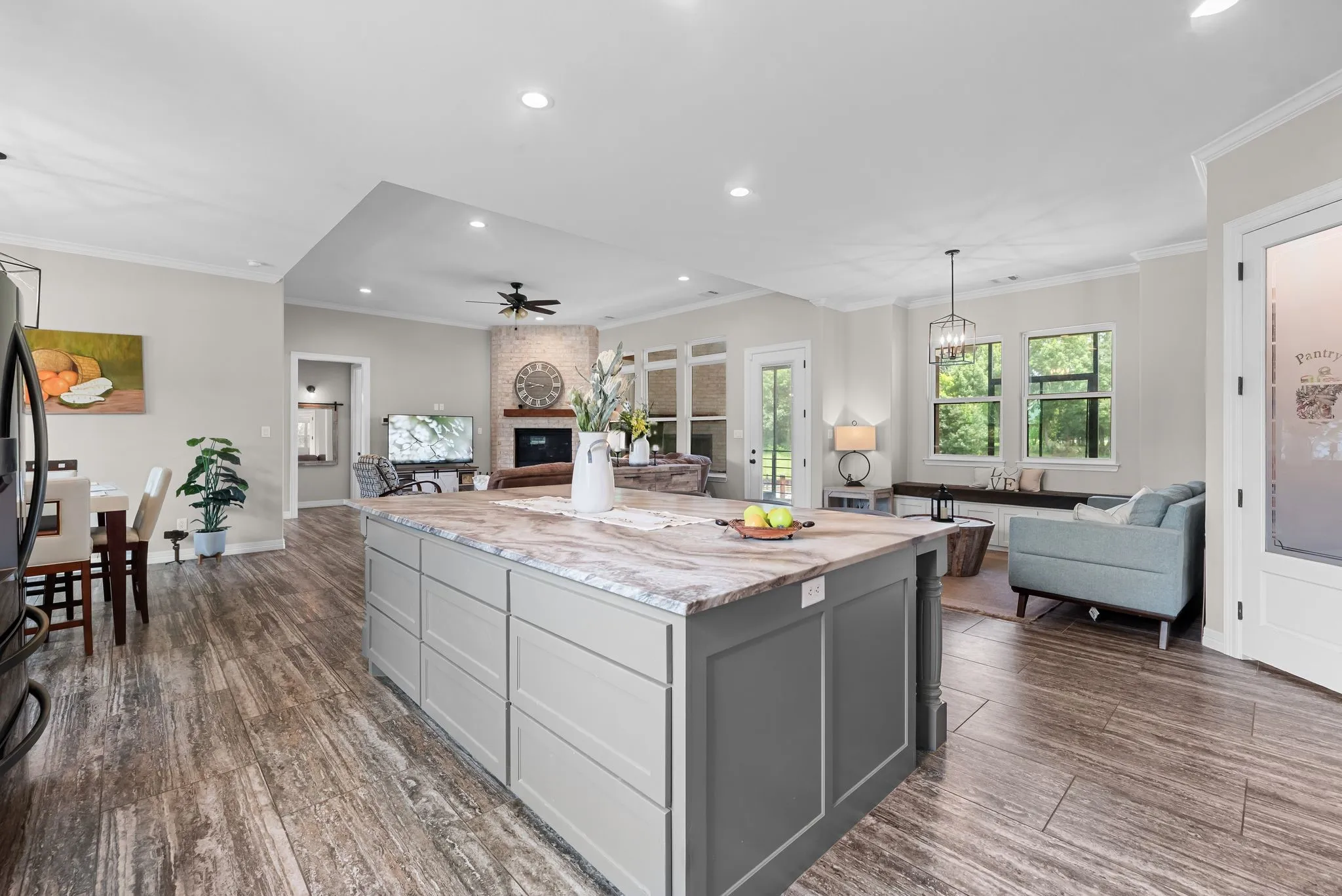 There is a walk in pantry and and TONS of custom cabinetry to stash away everything.