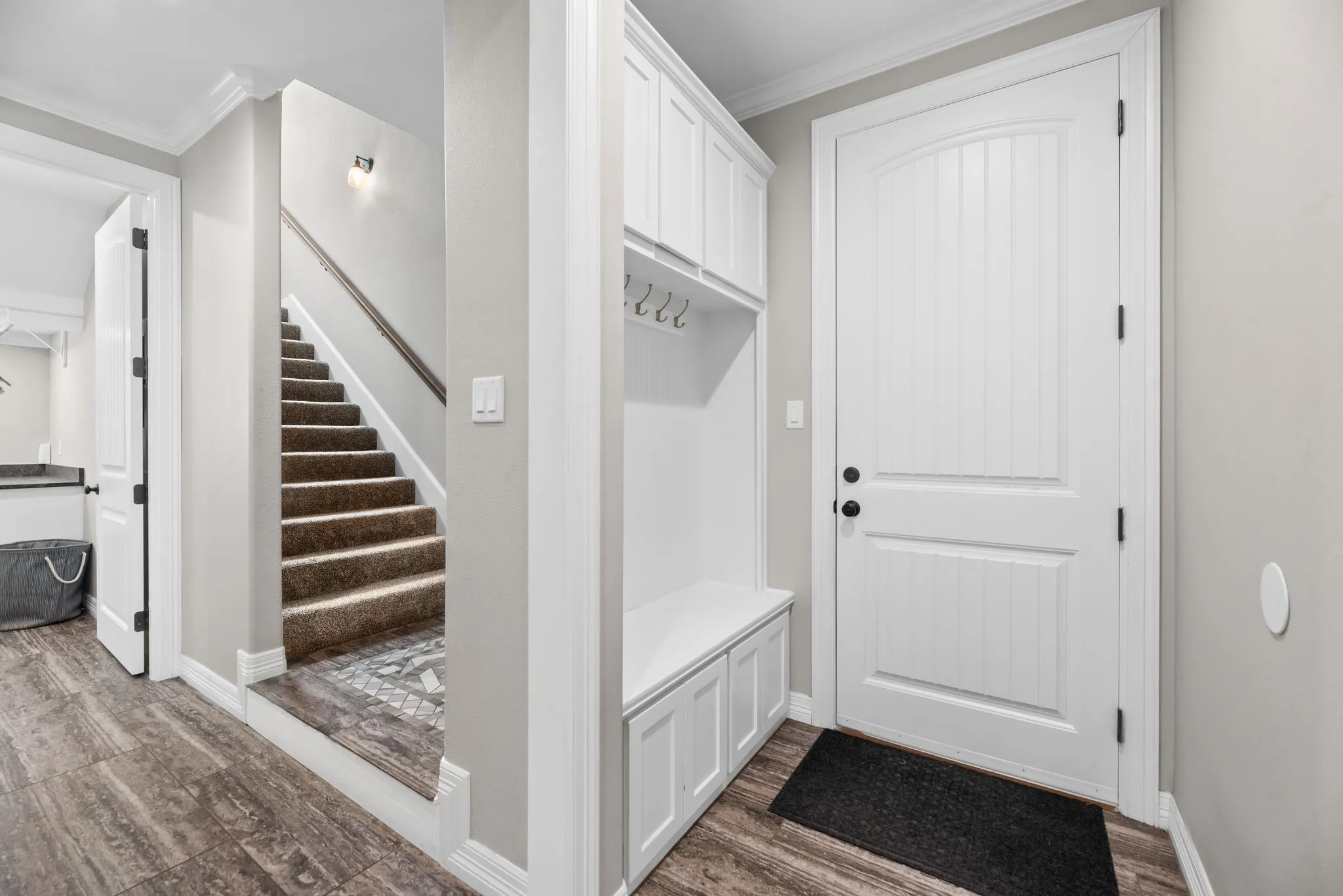The handy built in area right as you enter from the garage is great for stashing away coats and bags.