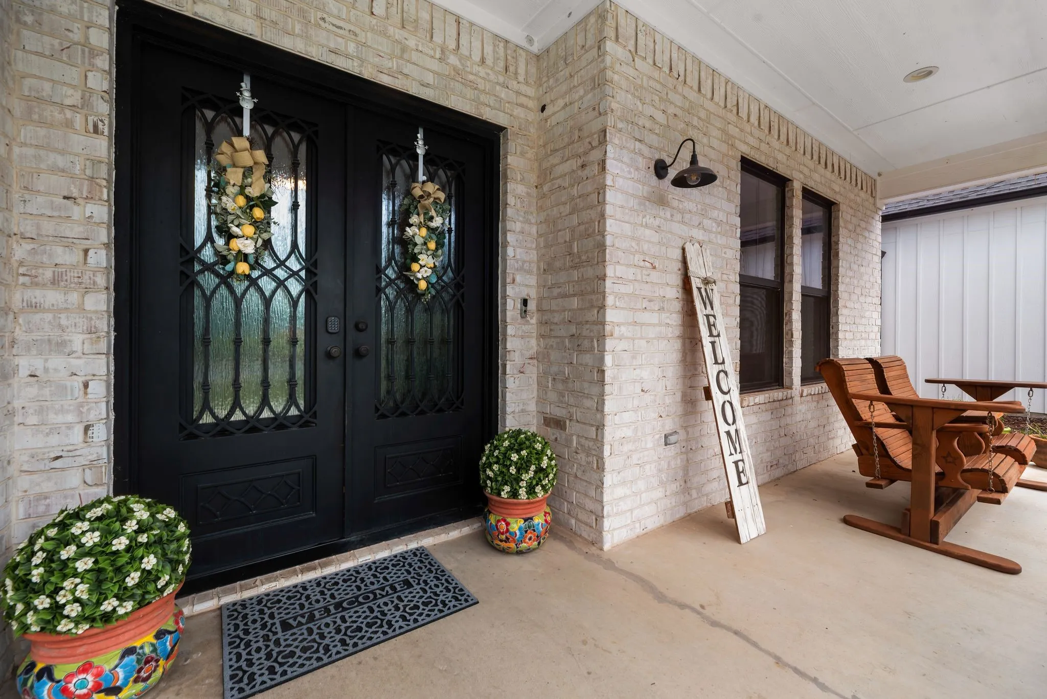 The gorgeous front entry is perfect for a few rocking chairs watch the sun rise!