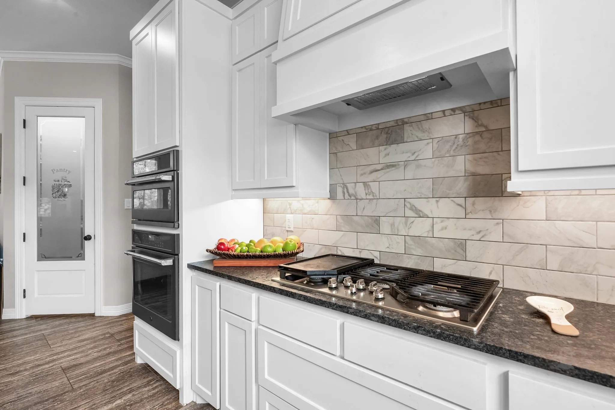 The built in in double oven and the gas range are standing by to help you whip up a feast for friends and family!