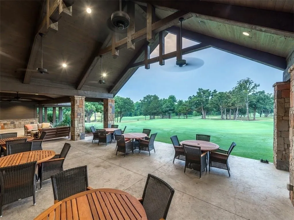 View of patio / terrace with outdoor dining space, outdoor lounge area, and a ceiling fan