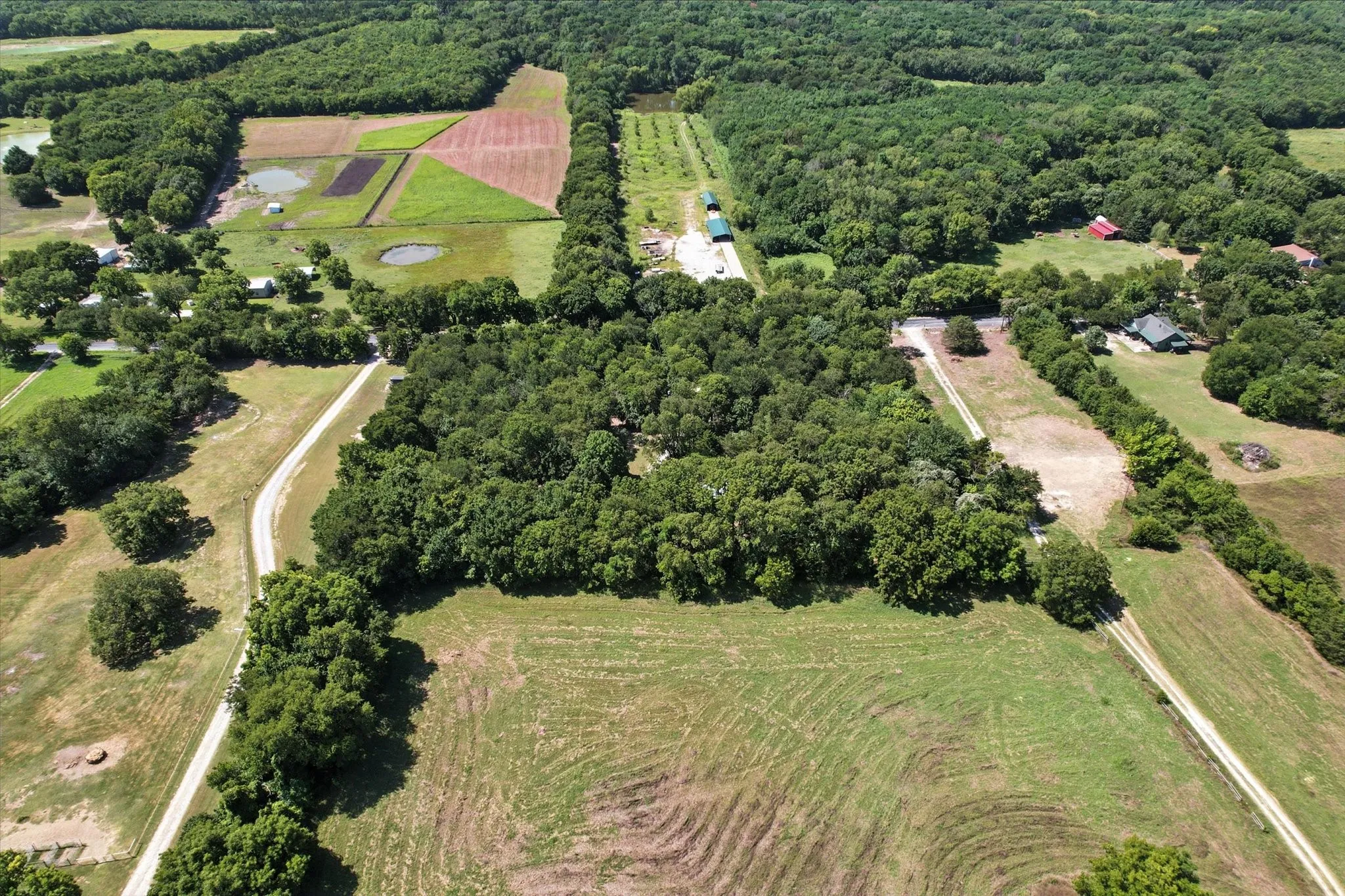 Aerial view of property's location featuring rural landscape