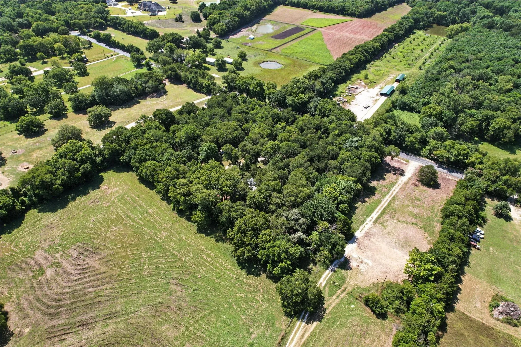 Aerial view of property's location featuring rural landscape