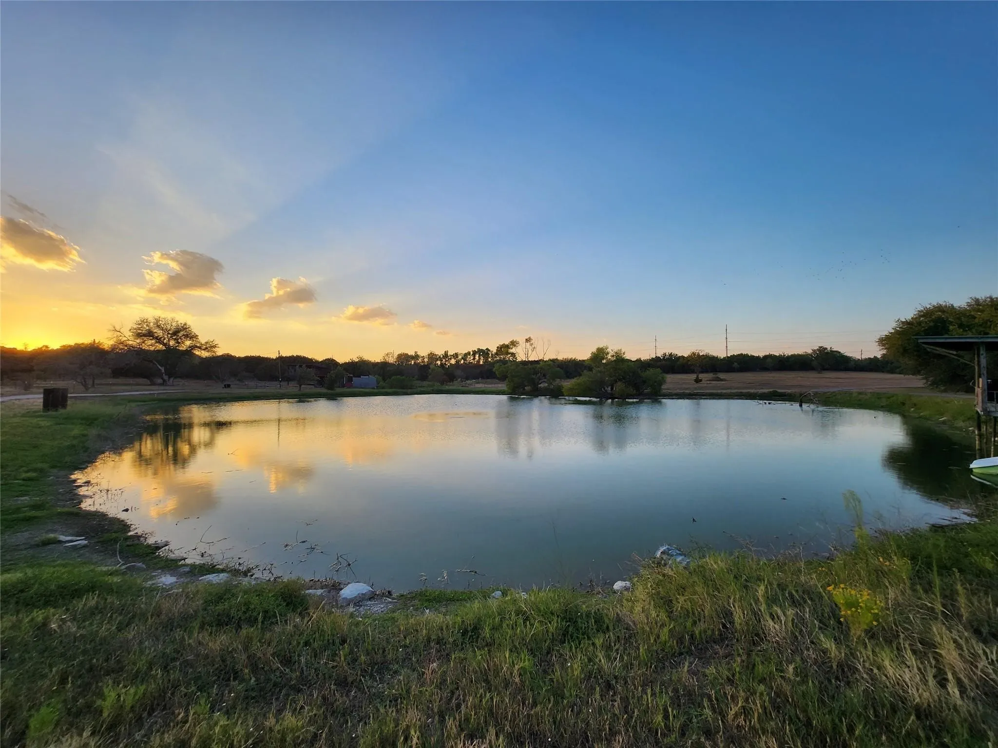 Fullly stocked pond with circulating pump.