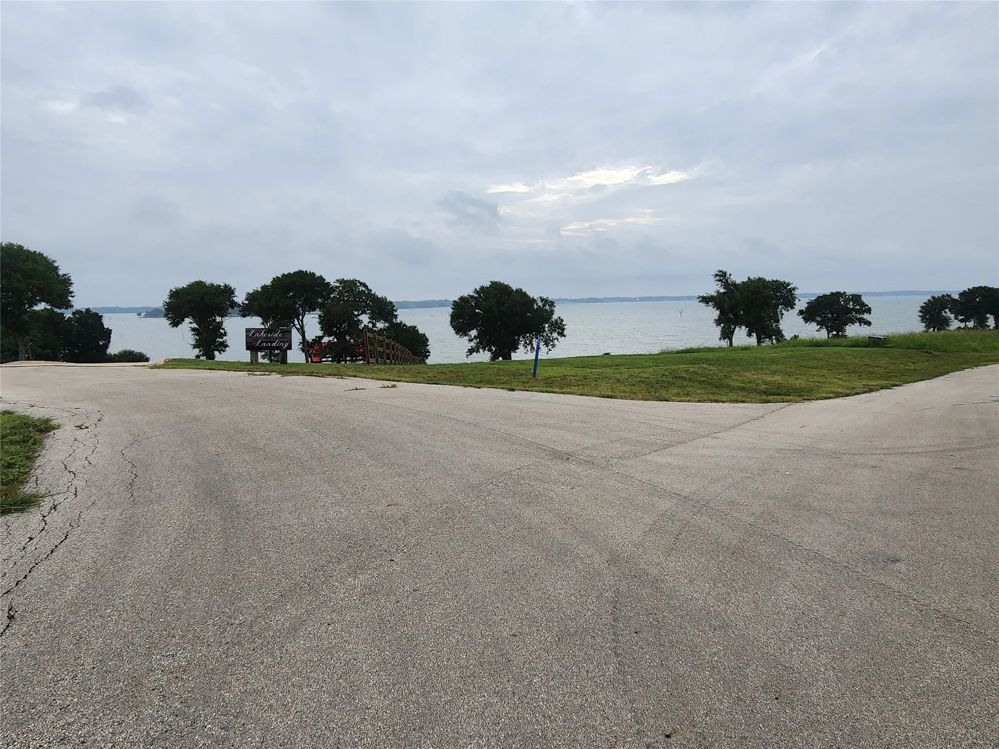 View of asphalt road featuring a water​​‌​​​​‌​​‌‌​‌‌​​​‌‌​‌​‌​‌​​​‌​​ view
