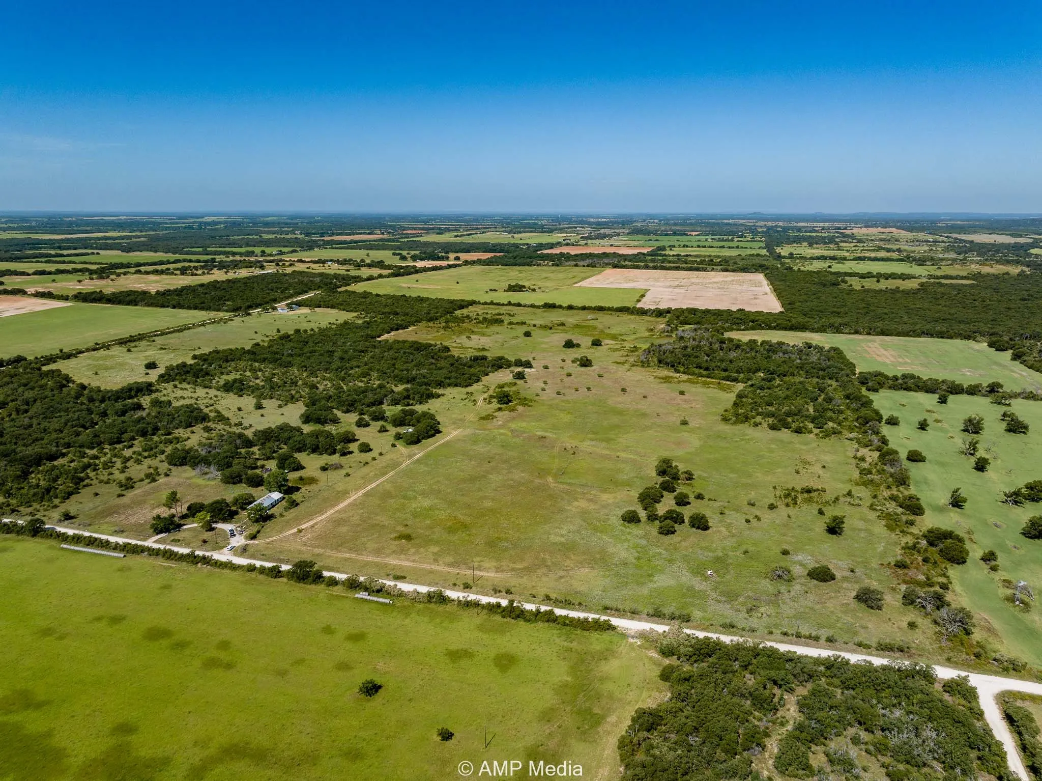 Aerial view of property's location featuring rural landscape