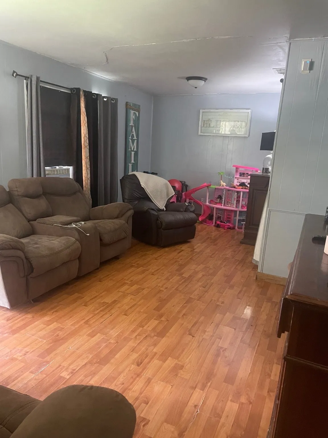 Living area with light wood-style flooring