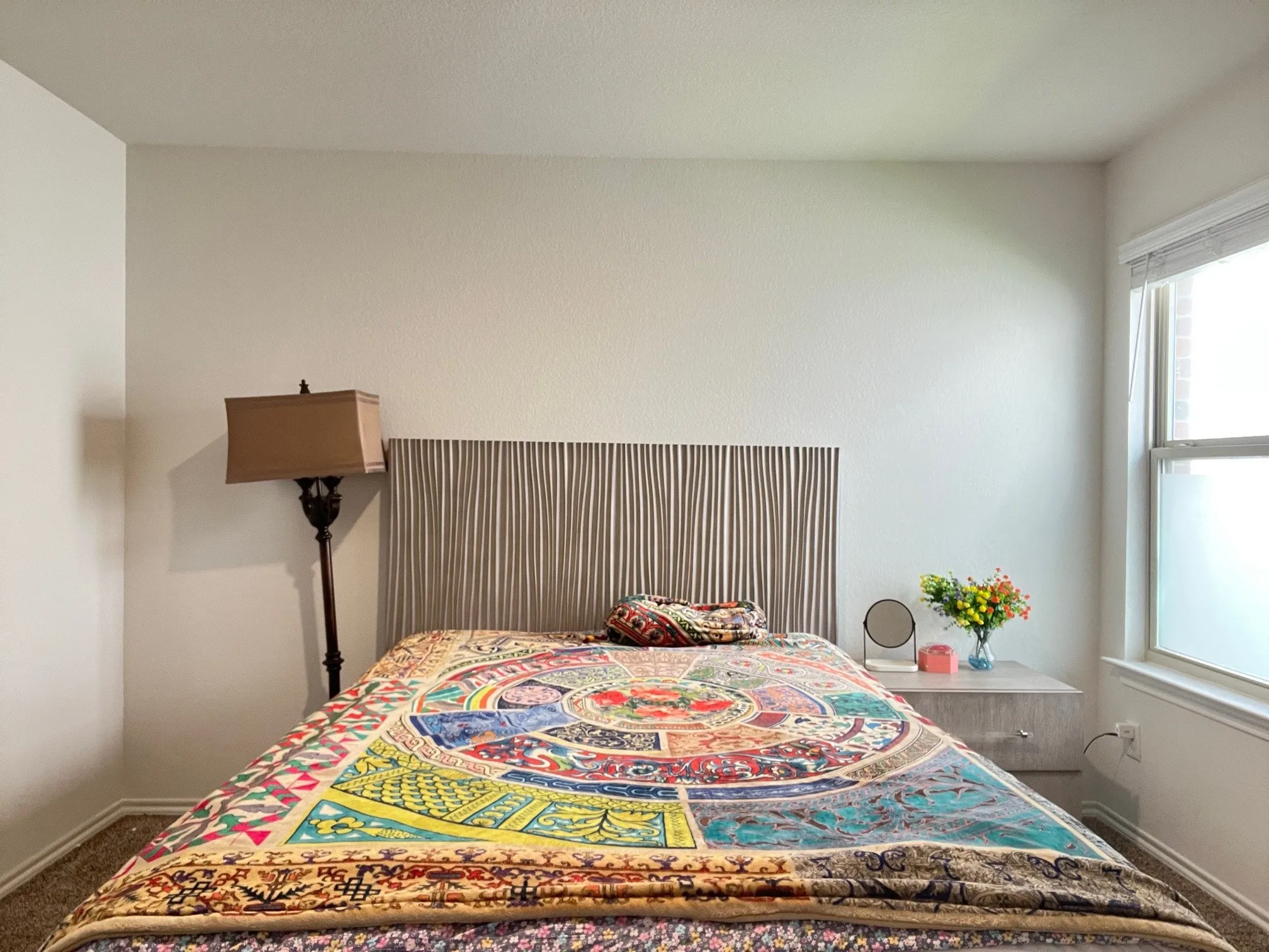 Bedroom with baseboards and carpet flooring