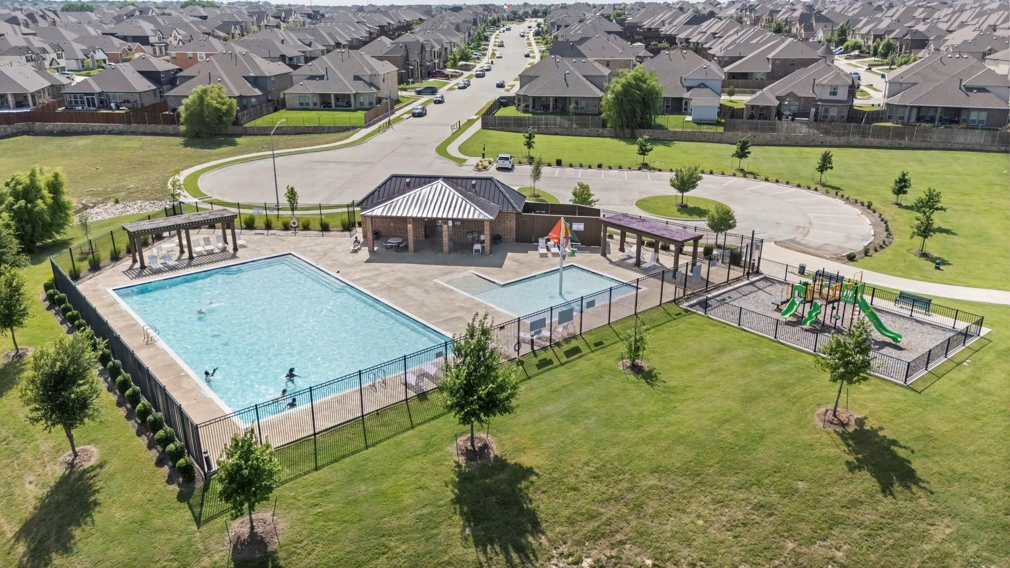 Aerial view of residential community  featuring a pool
